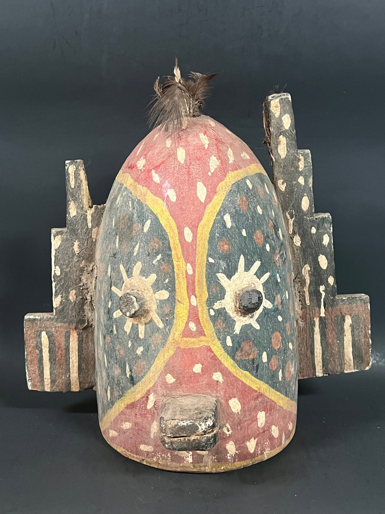 Carved Wooden Kachina Style Mask: Carved Wood Kachina Style Mask. The dimension is 11.5 inches high x 12 inches wide. Please be aware that some of the items are vintage, secondhand, old ages, antiques and may have a defects or sign of