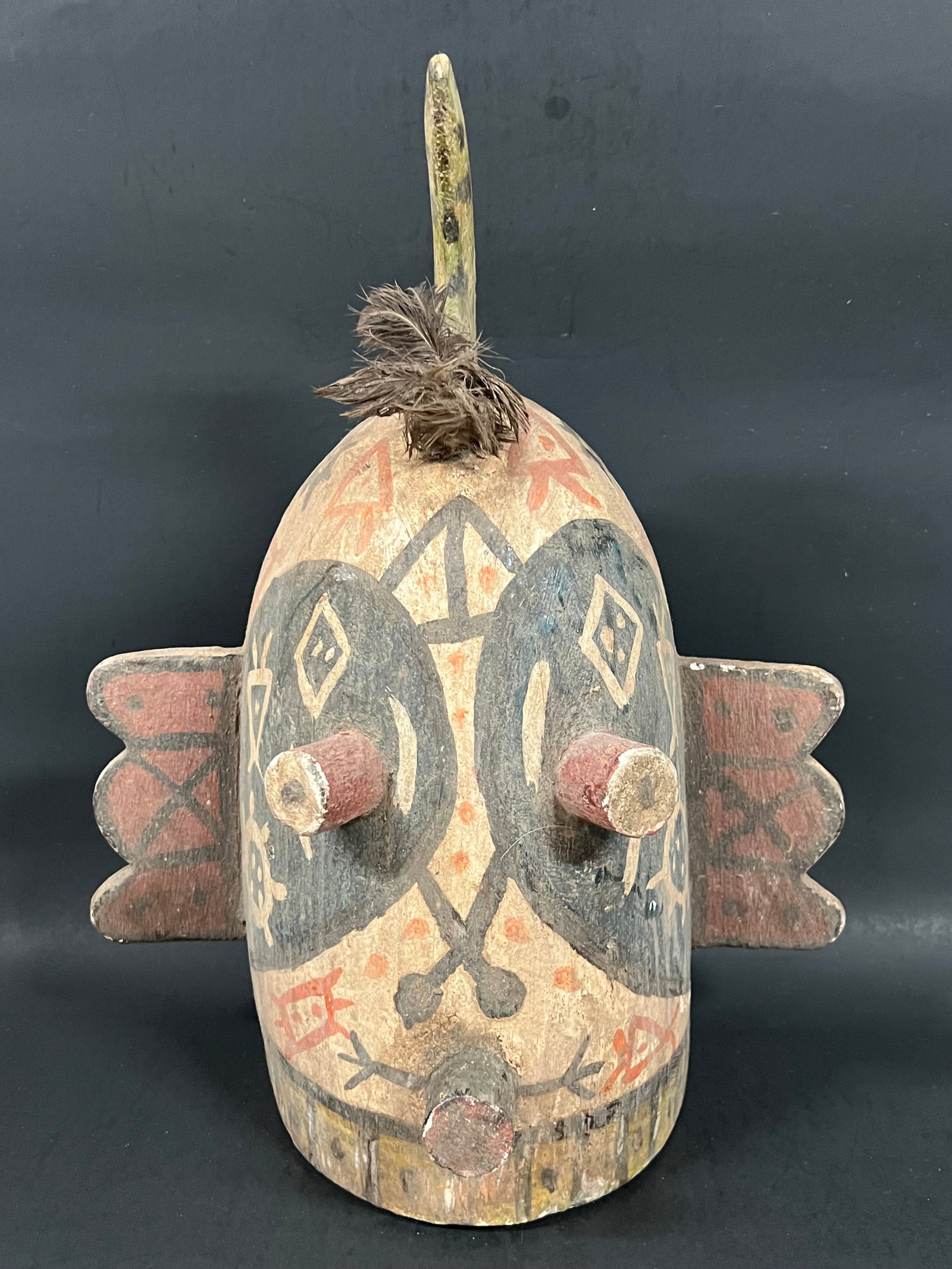 Carved Wooden Kachina Style Mask: Carved Wood Kachina Style Mask. The dimension is 14.5 inches high x 10.5 inches wide. Please be aware that some of the items are vintage, secondhand, old ages, antiques and may have a defects or sign 