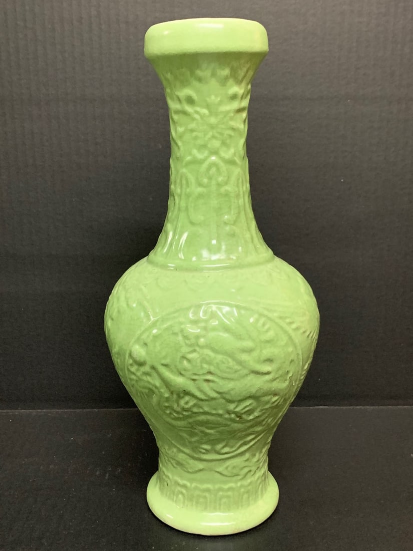 Chinese Art Porcelain Mint Green Vase Raised Floral and Bird Design: Chinese Art Porcelain Mint Green Vase Raised Floral and Bird Design. The dimension is 13.5 inches high x 5 inches wide. Please be aware that some of the items are vintage, secondhand, old ages, antiqu