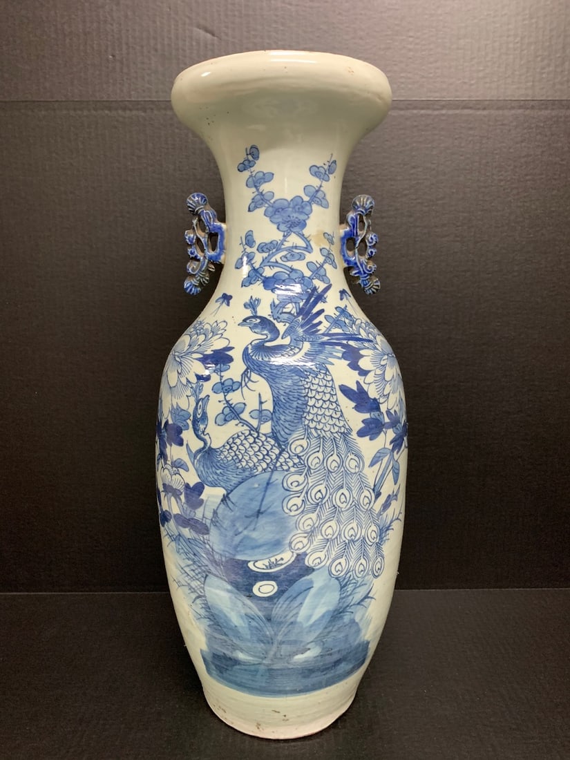 Chinese Art Porcelain Blue and White Vase: Chinese Art Porcelain Blue and White Vase. The dimension is 24 inches high x 10 inches wide. Please be aware that some of the items are vintage, secondhand, old ages, antiques and may have a defects o