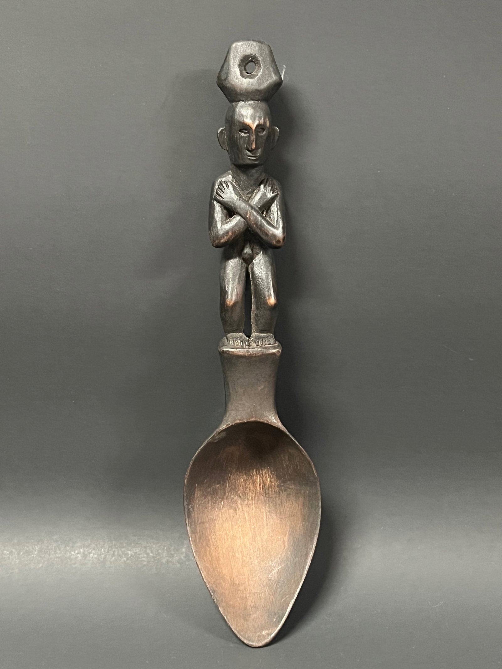 Philippine Tribal Art Carved Wood Ifugao Bulul Spoon: Philippine Tribal Art Carved Wood Ifugao Bulul Spoon. The dimension is 11 inches high x 3 inches wide. Please be aware that some of the items are vintage, secondhand, old ages, antiques and may have a