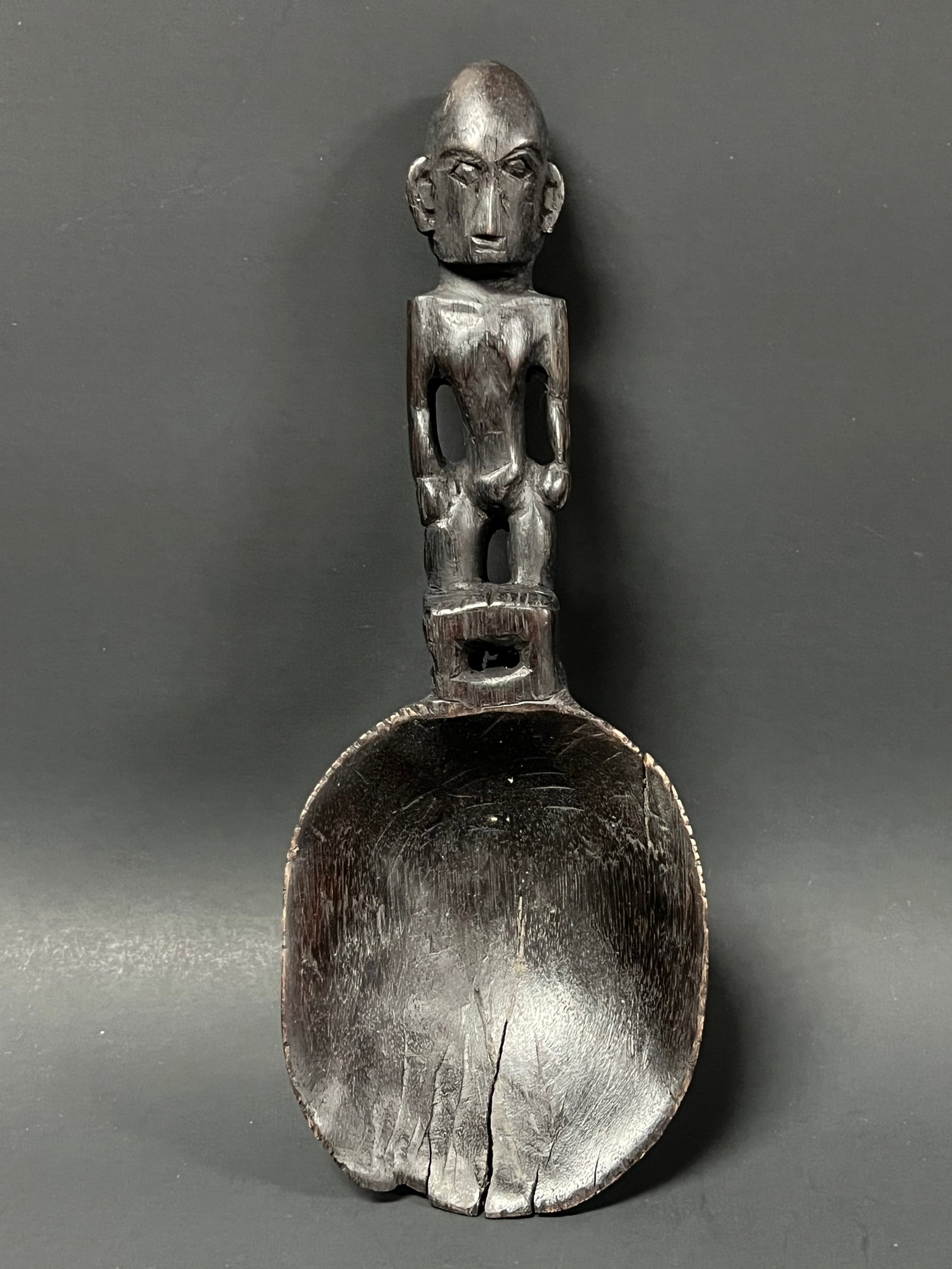 Philippine Tribal Art Carved Wood Ifugao Bulul Spoon: Philippine Tribal Art Carved Wood Ifugao Bulul Spoon. The dimension is 11 inches high x 5 inches wide. Please be aware that some of the items are vintage, secondhand, old ages, antiques and may have a