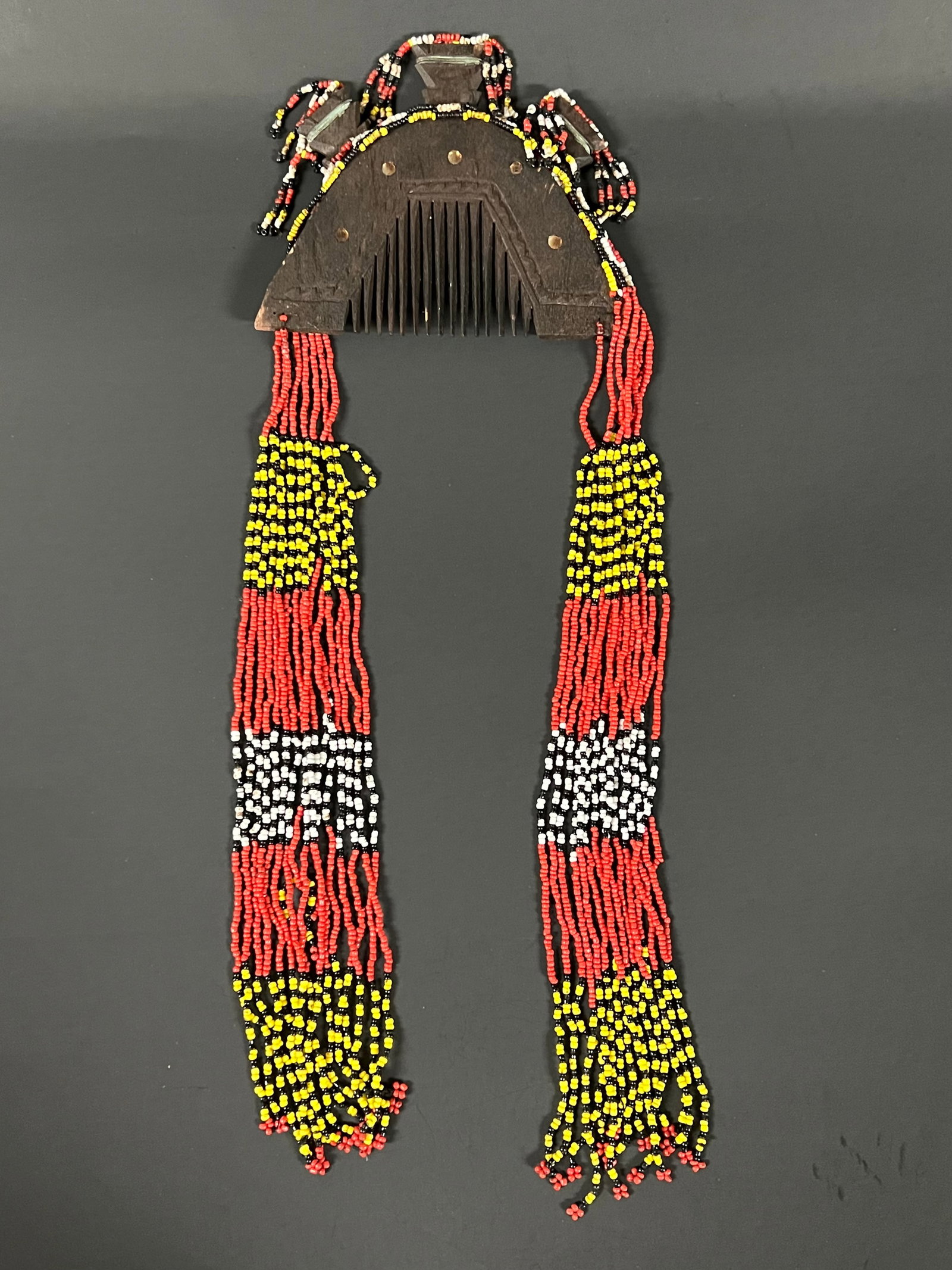 Philippine Tribal Art Carved Wood T'Boli Tribe Comb and Beads Headdress: Philippine Tribal Art Carved Wood T'boli Tribe Comb and Beads Headdress. The dimension is 15 inches high x 6 inches wide. Please be aware that some of the items are vintage, secondhand, old ages,