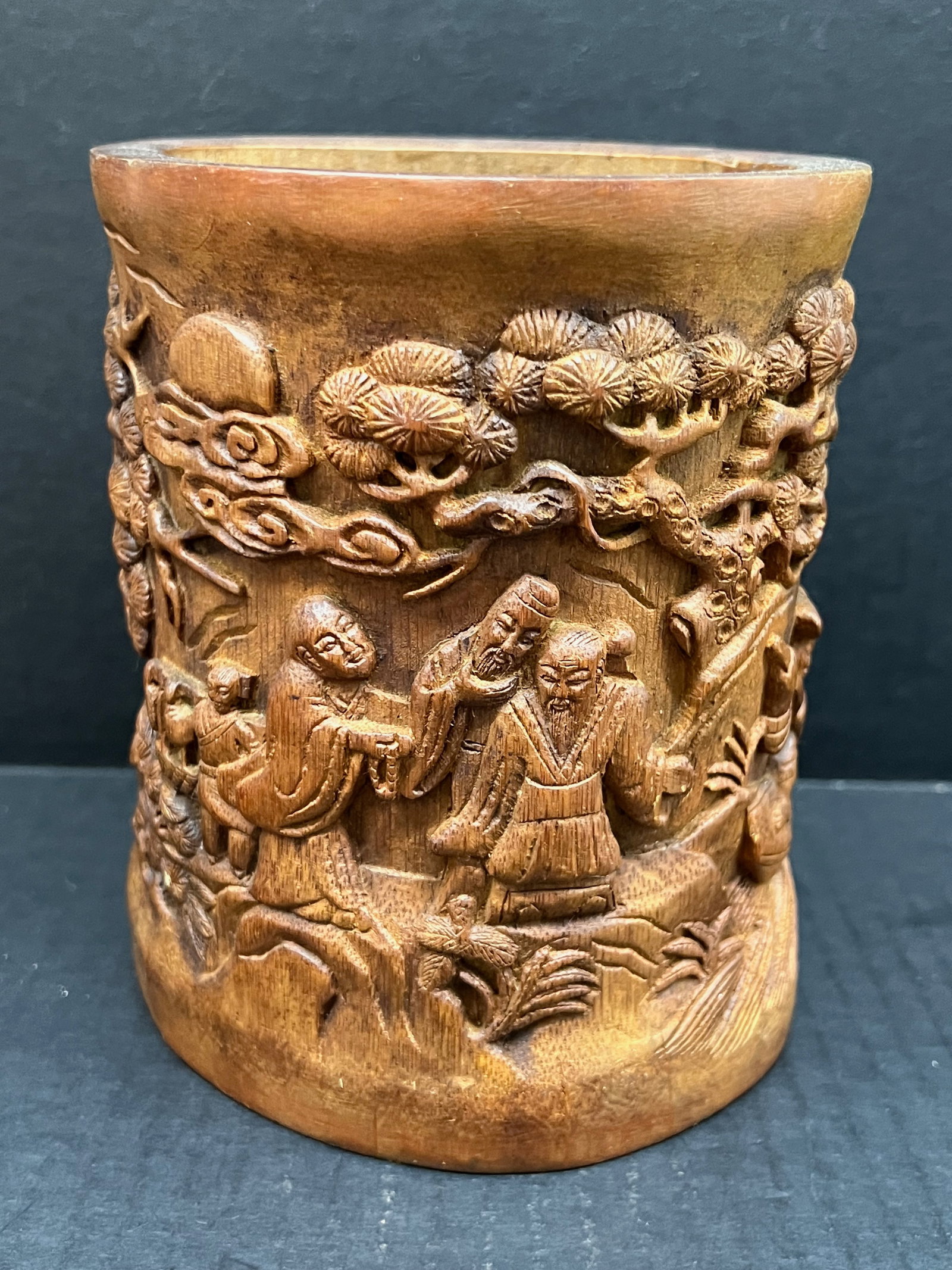 Carved Bamboo Brushpot: Chinese Art Carved Wood Bamboo Brushpot. The dimension is 6.25 inches high x 5.5 inches wide. Please be aware that some of the items are vintage, secondhand, old ages, antiques and may have a defects 