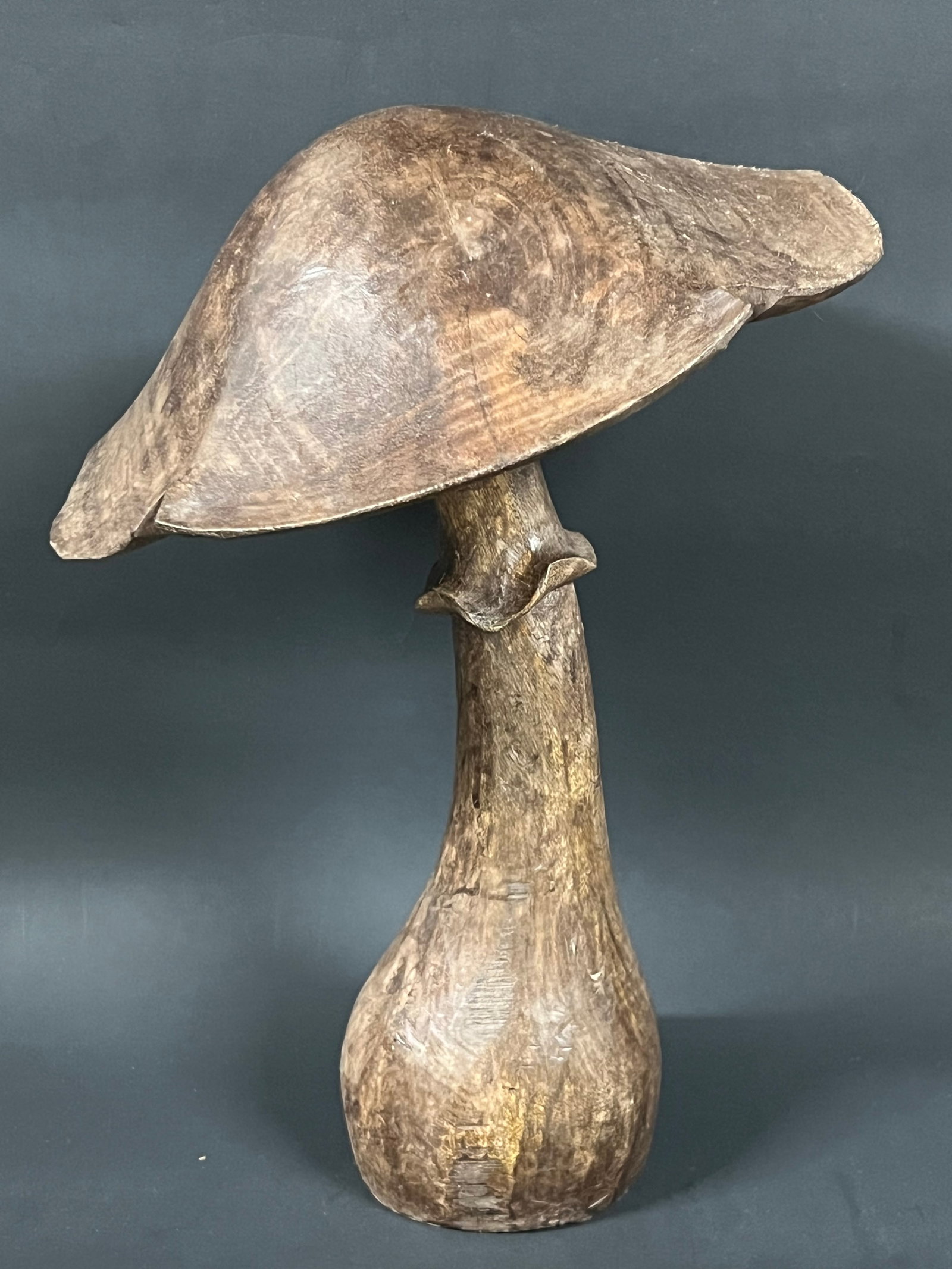 Folk Art Hand Carved Wooden Mushroom Home Decor Sculpture: Vintage Folk Art Hand Carved Wooden Mushroom Home Decor Sculpture. The dimension is 12 inches high x 9 inches wide. Please be aware that some of the items are vintage, secondhand, old ages, antiques a