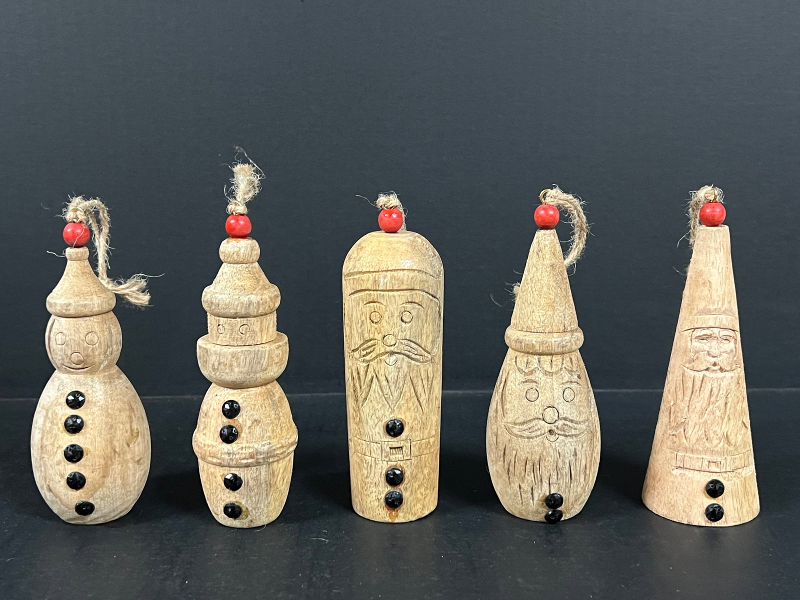 Folk Art Hand Carved Wooden Christmas Ornaments Sculpture Set of 5: Vintage Folk Art Hand Carved Wooden Christams Ornaments Home Decor Sculpture Set of 5. The dimension is 5.5 inches high x 2 inches wide. Please be aware that some of the items are vintage, secondhand,