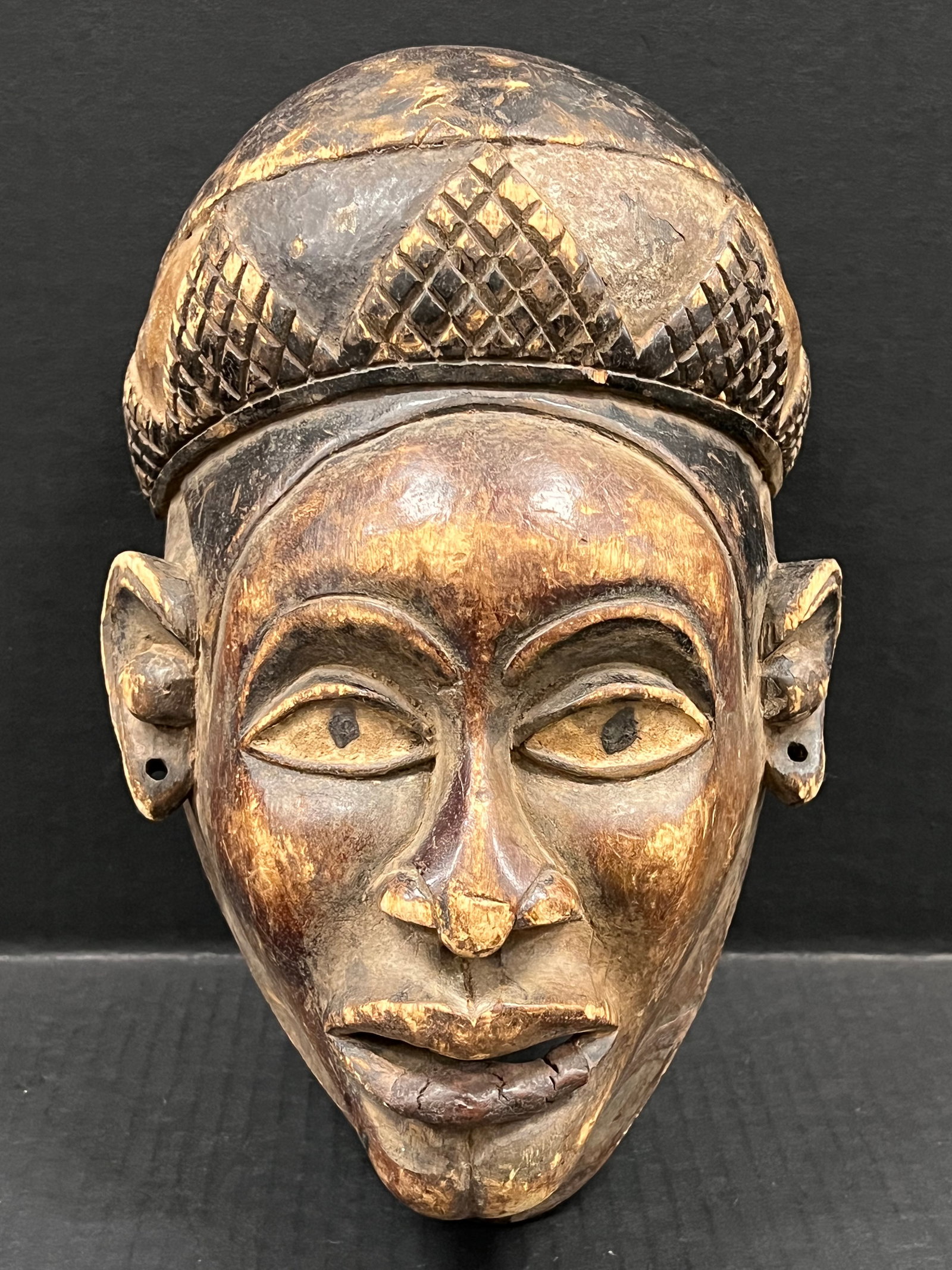 Carved Wood Bacongo Mask: African Tribal Art Carved Wood Bacongo Mask. The dimension is 12 inches high x 8 inches wide. Please be aware that some of the items are vintage, secondhand, old ages, antiques and may have a defects 