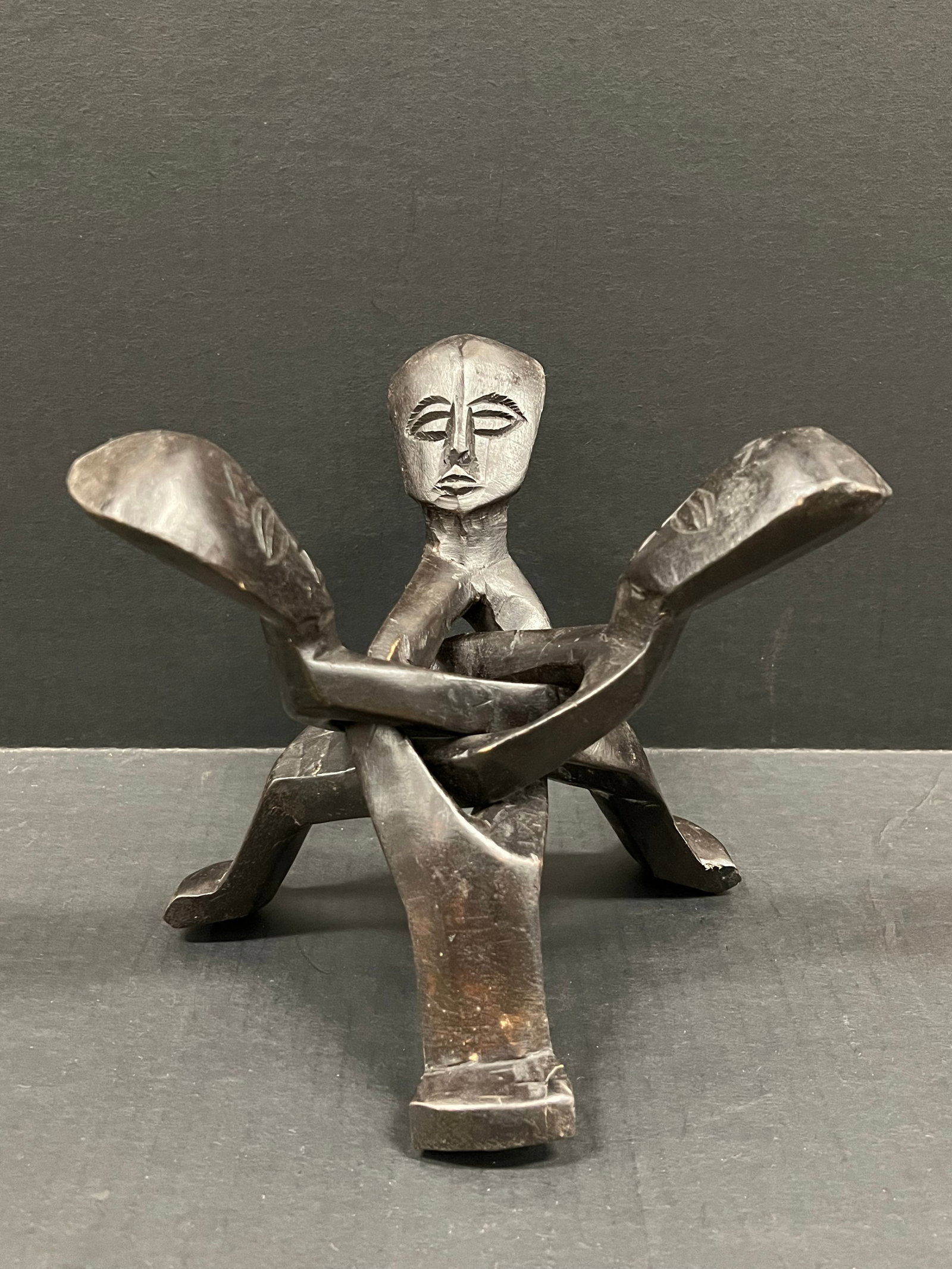 Carved Wood Ghana Unity Statue: African Tribal Art Carved Wood Ghana Unity Statue. The dimension is 7.5 inches high x 6.5 inches wide. Please be aware that some of the items are vintage, secondhand, old ages, antiques and may have