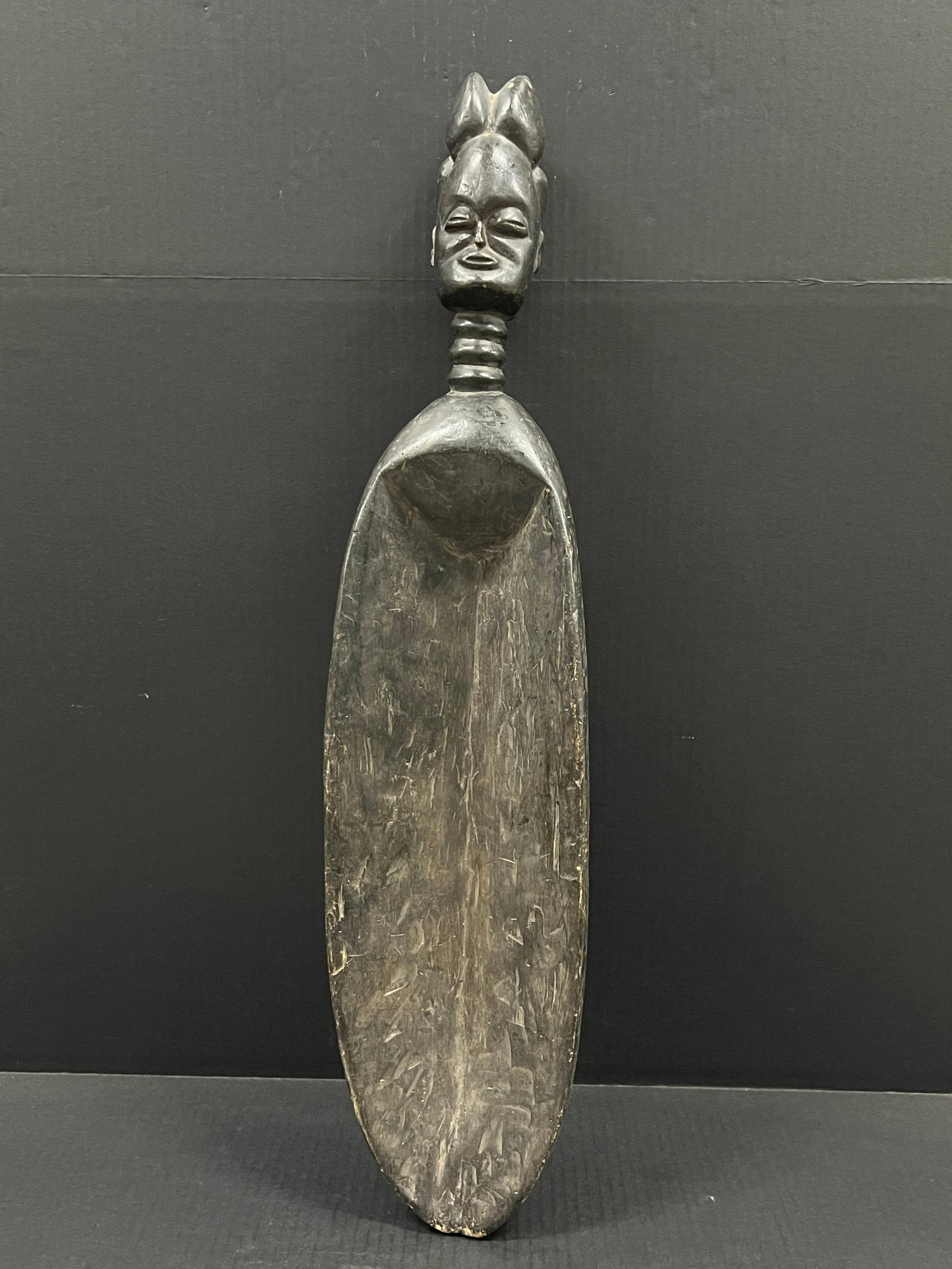 African Tribal Art Makonde Spoon: African Tribal Art Makonde Spoon. The dimension is 30 inches high x 7 inches wide. Please be aware that some of the items are vintage, secondhand, old ages, antiques and may have a defects or sign of 