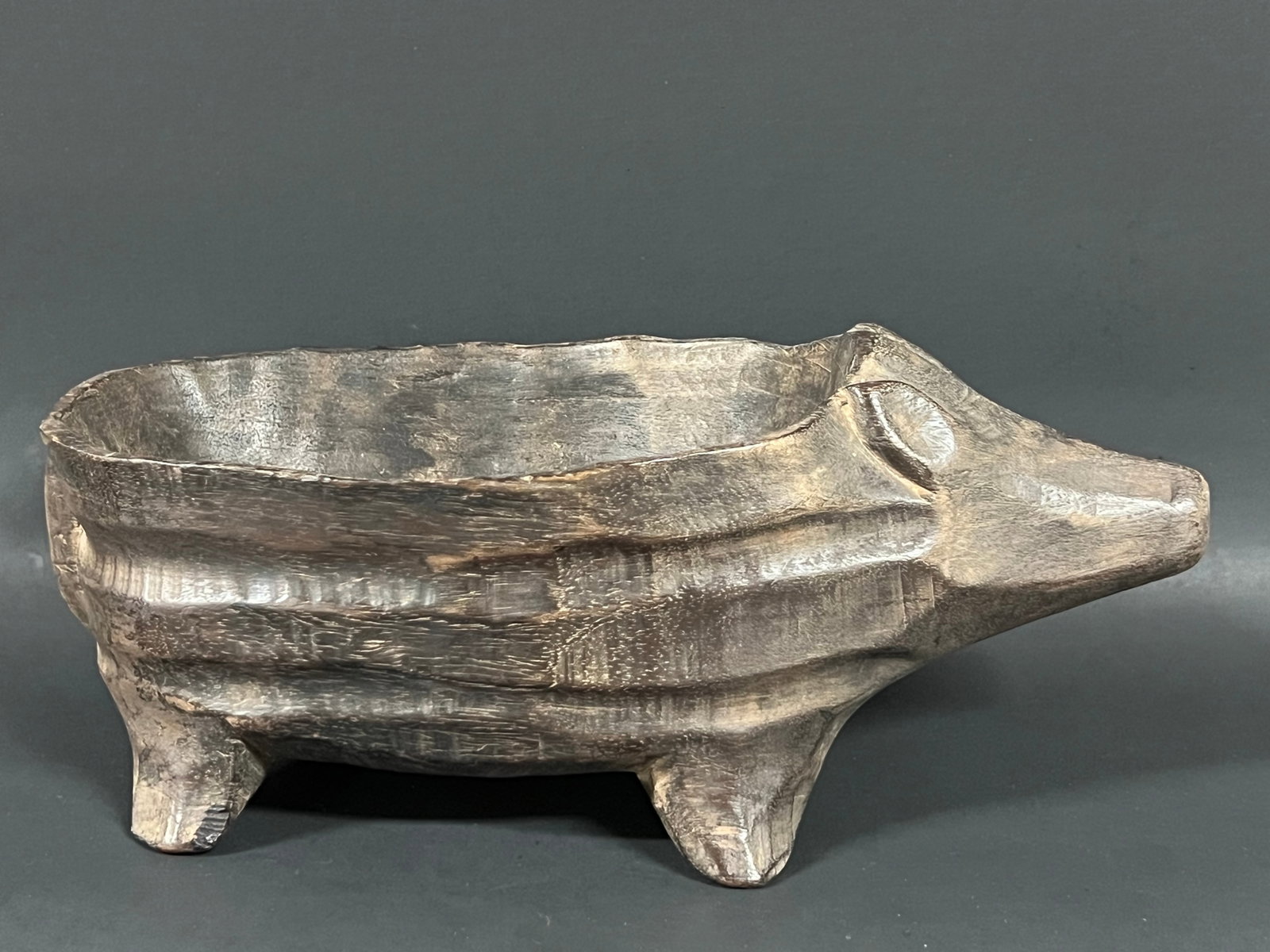 Philippine Tribal Art Carved Wooden Bulul Pig Binaboy Bowl: Philippine Tribal Art Carved Wooden Bulul Pig Binaboy Bowl Sculpture. The dimension is 4.5 inches high x 10.5 inches wide. Please be aware that some of the items are vintage, secondhand, old ages, ant