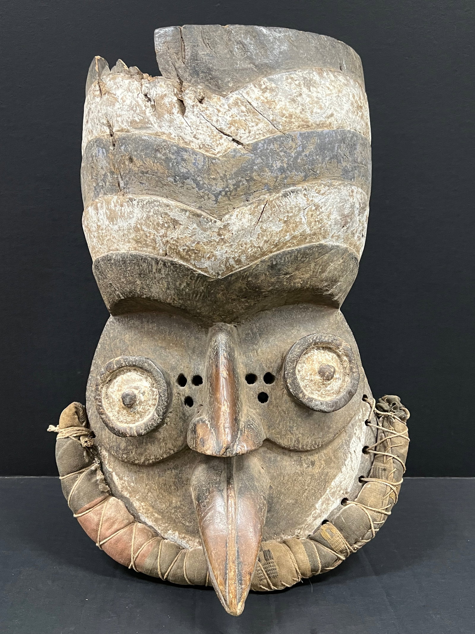 Bronze Bamileke Mask: African Tribal Art Bronze Bamileke Mask. The dimension is 19 inches high x 12.5 inches wide. Please be aware that some of the items are vintage, secondhand, old ages, antiques and may have a defects o