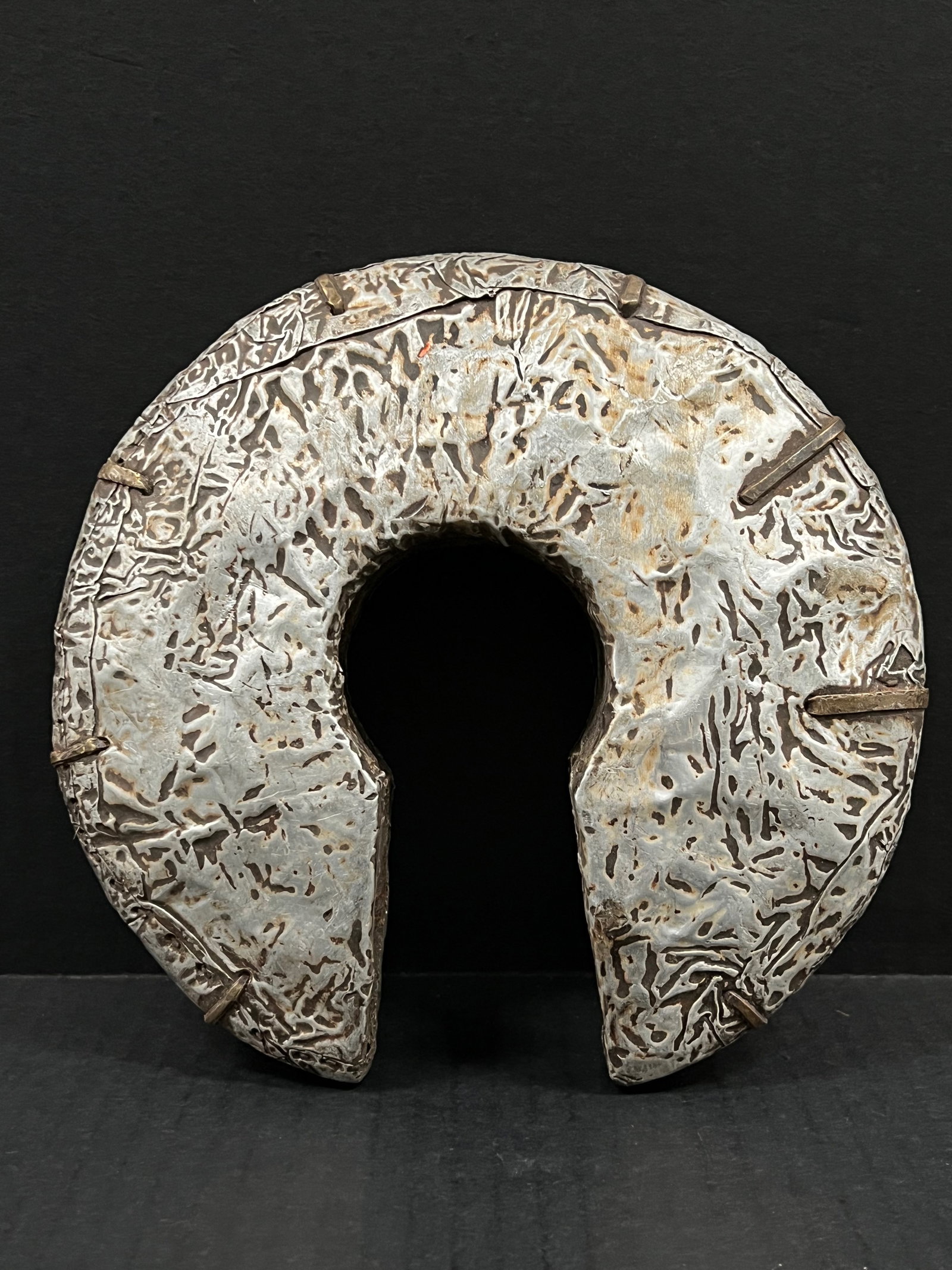 Carved Wood and Tin Metal Currency: African Tribal Art Carved Wood And Tin Metal Currency. The dimension is 7.5 inches high x 7.5 inches wide. Please be aware that some of the items are vintage, secondhand, old ages, antiques and may ha