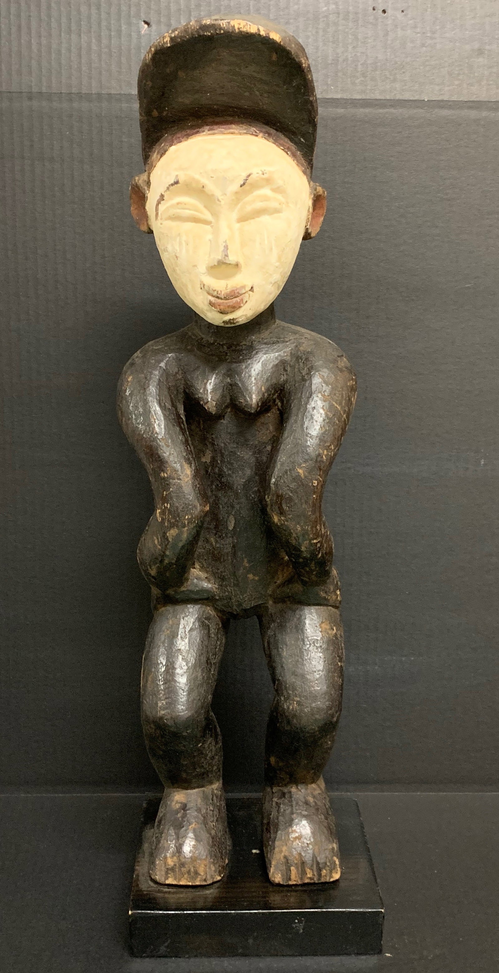 Carved Wood Lumbo Statue