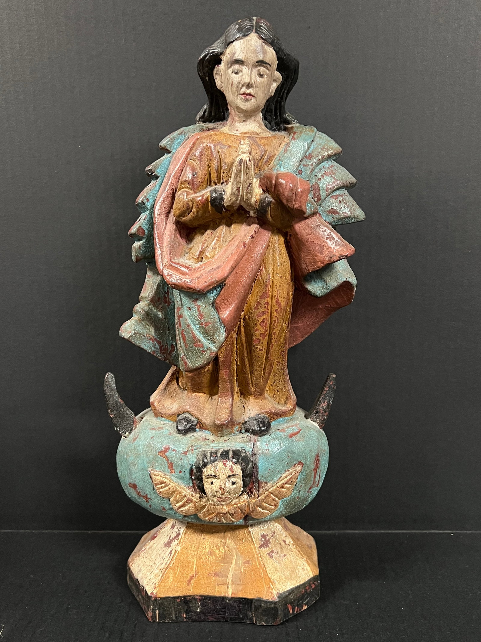 Carved Wood Virgin Mary Sculpture: Religious Art Carved Wood Virgin Mary Sculpture. The dimension is 17nches high x 7 inches wide. Please be aware that some of the items are vintage, secondhand, old ages, antiques and may have a defect