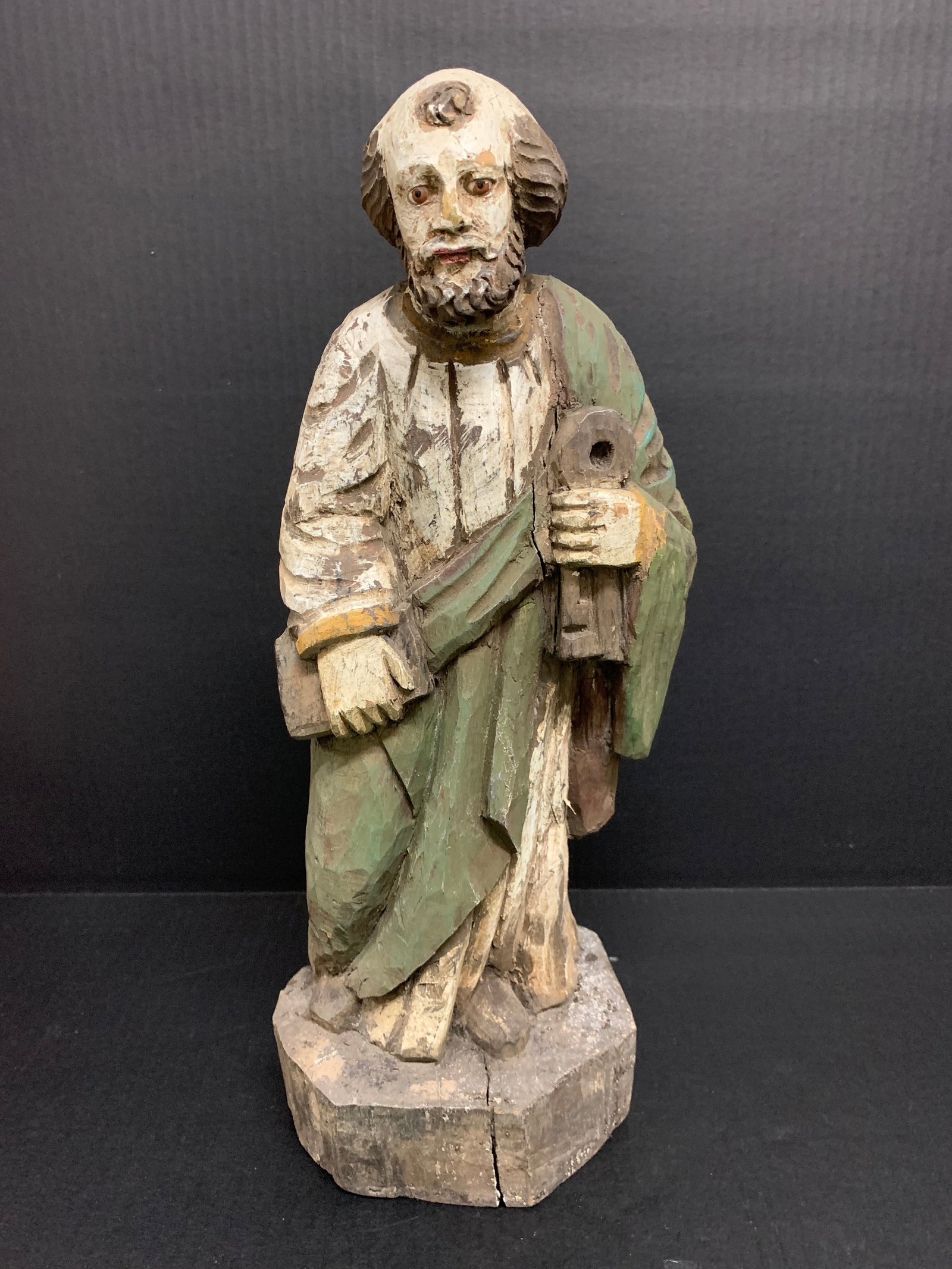 Carved Wood Saint Peter Sculpture: Religious Art Carved Wood Saint Peter Sculpture. The dimension is 16.5 inches high x 6.5 inches wide. Please be aware that some of the items are vintage, secondhand, old ages, antiques and may have a 