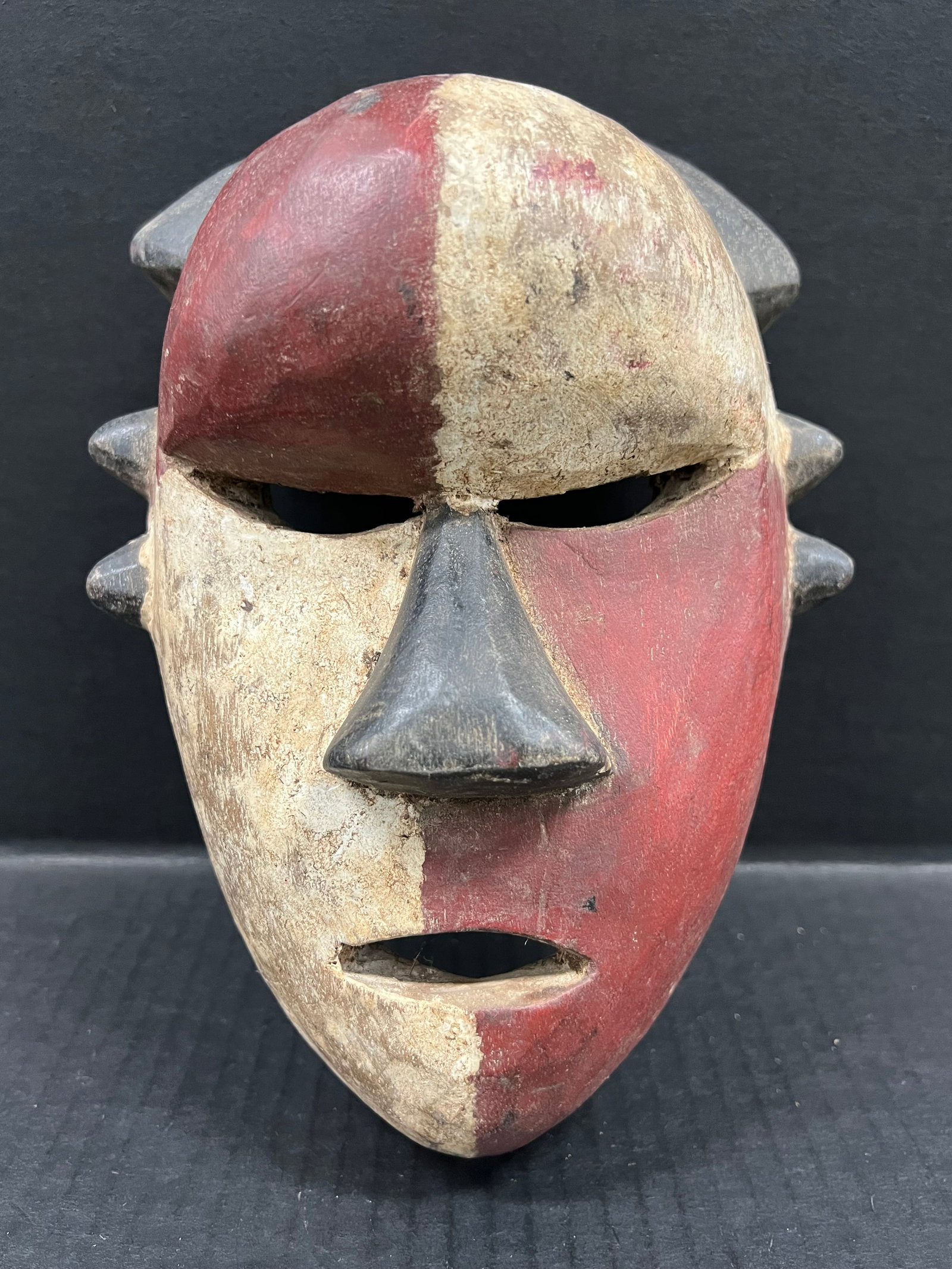 Carved Wood Salampaso Mask: African Tribal Art Carved Wood Salampaso Mask. The dimension is 9.5 inches high x 7 inches wide. Please be aware that some of the items are vintage, secondhand, old ages, antiques and may have a defec