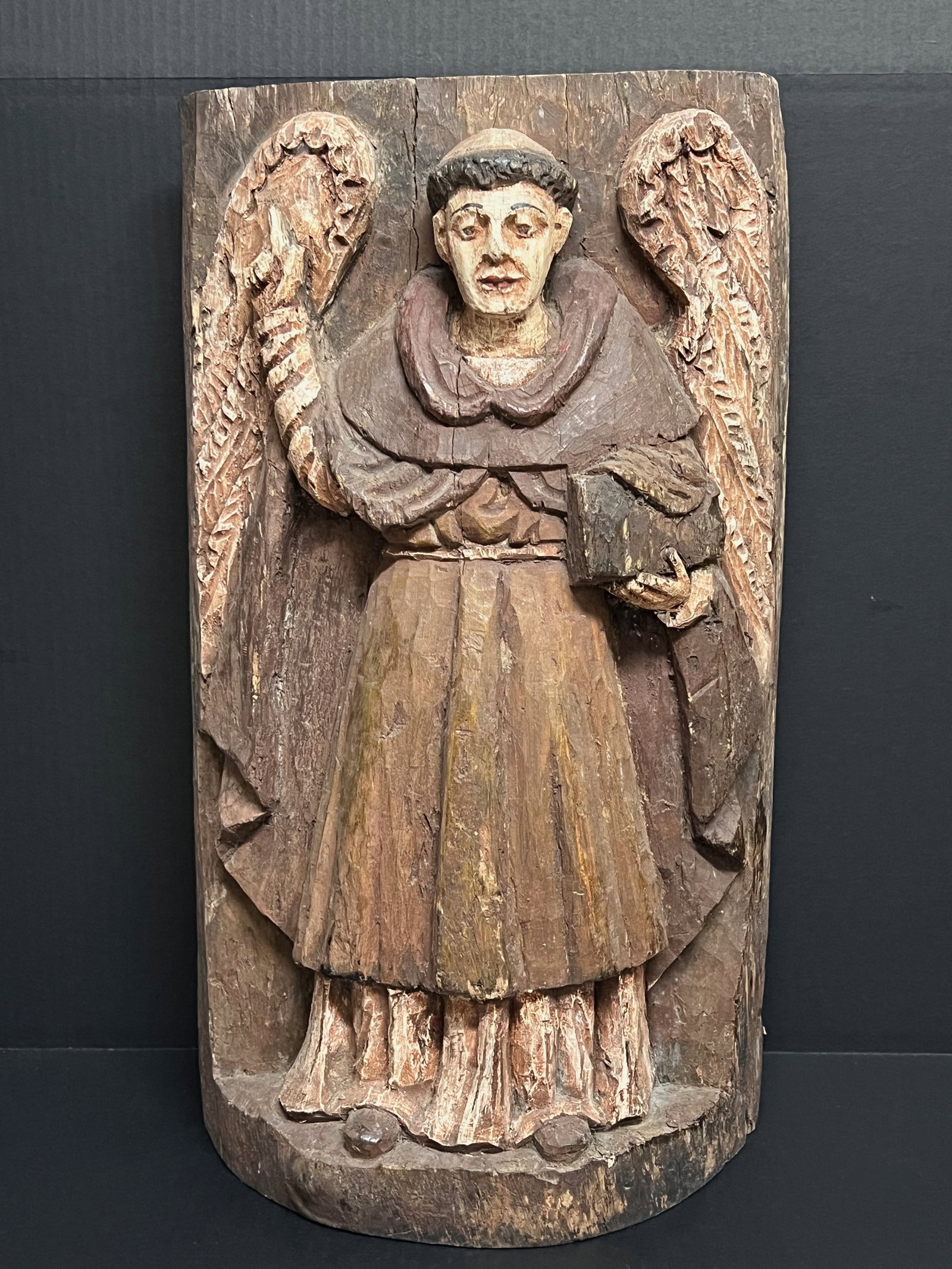 Carved Wood Saint Vincent Ferrer Wall Plaque: Religious Art Carved Wood Saint Vincent Ferrer Wall Plaque. The dimension is 34 inches high x 3 inches depth x 12.5 inches wide. Please be aware that some of the items are vintage, secondhand, old age