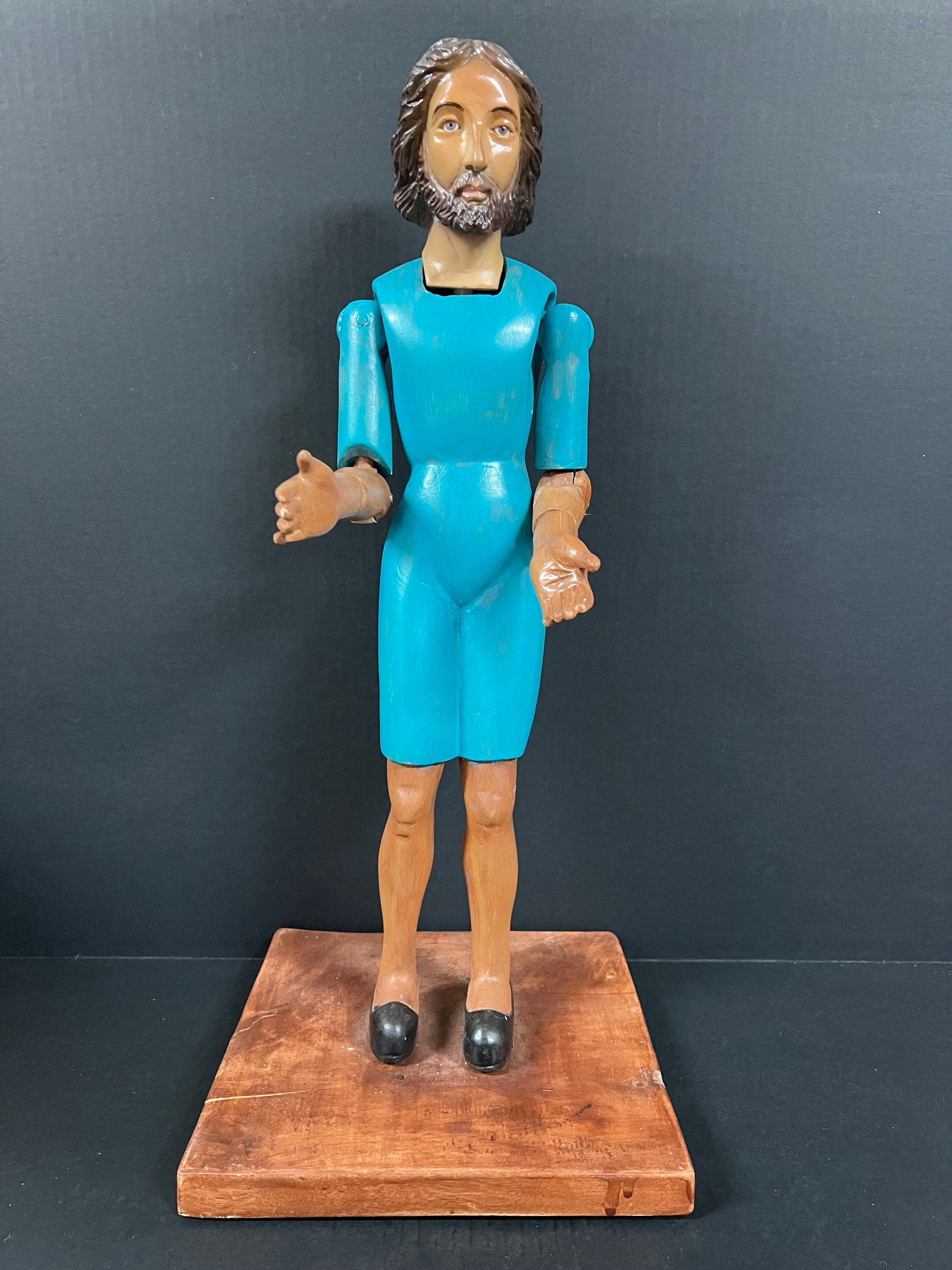 Carved Wood Articulated Hand Male Mannequin with Glass Eyes: Religious Art Carved Wood Articulated Hand Male Mannequin. The dimension is 22 inches high x 10 inches wide. Please be aware that some of the items are vintage, secondhand, old ages, antiques and may 