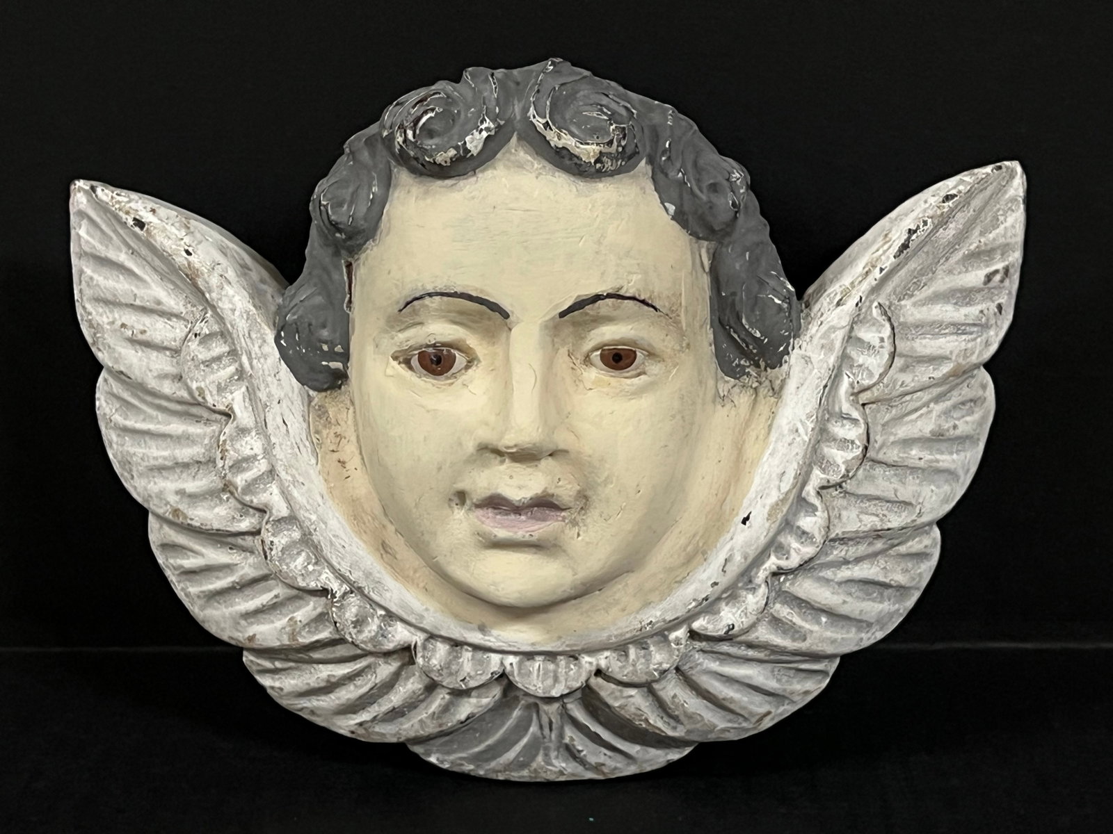 Carved Wood Cherub: Religious Art Carved Wood Cherub. The dimension is 6.5 inches high x 8.75 inches wide. Please be aware that some of the items are vintage, secondhand, old ages, antiques and may have a defects or sign