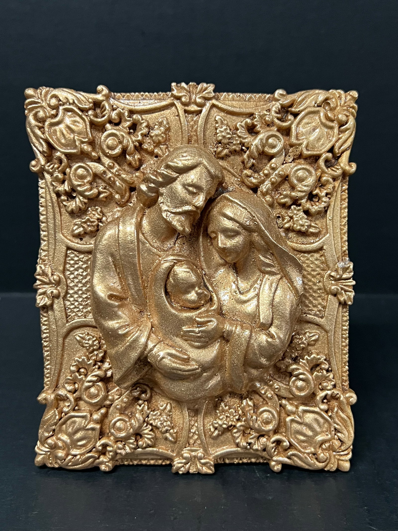 Philippine Cast Mount Pinatubo and Taal Volcano Ash Gold Painted Icon of Holy Family: Religious Art Philippine Cast Mount Pinatubo and Taal Volcano Ash Gold Painted Icon of Holy Family. The dimension is 5.5 inches high x 1.5 inches depth x 4.75 inches wide. Please be aware that some of