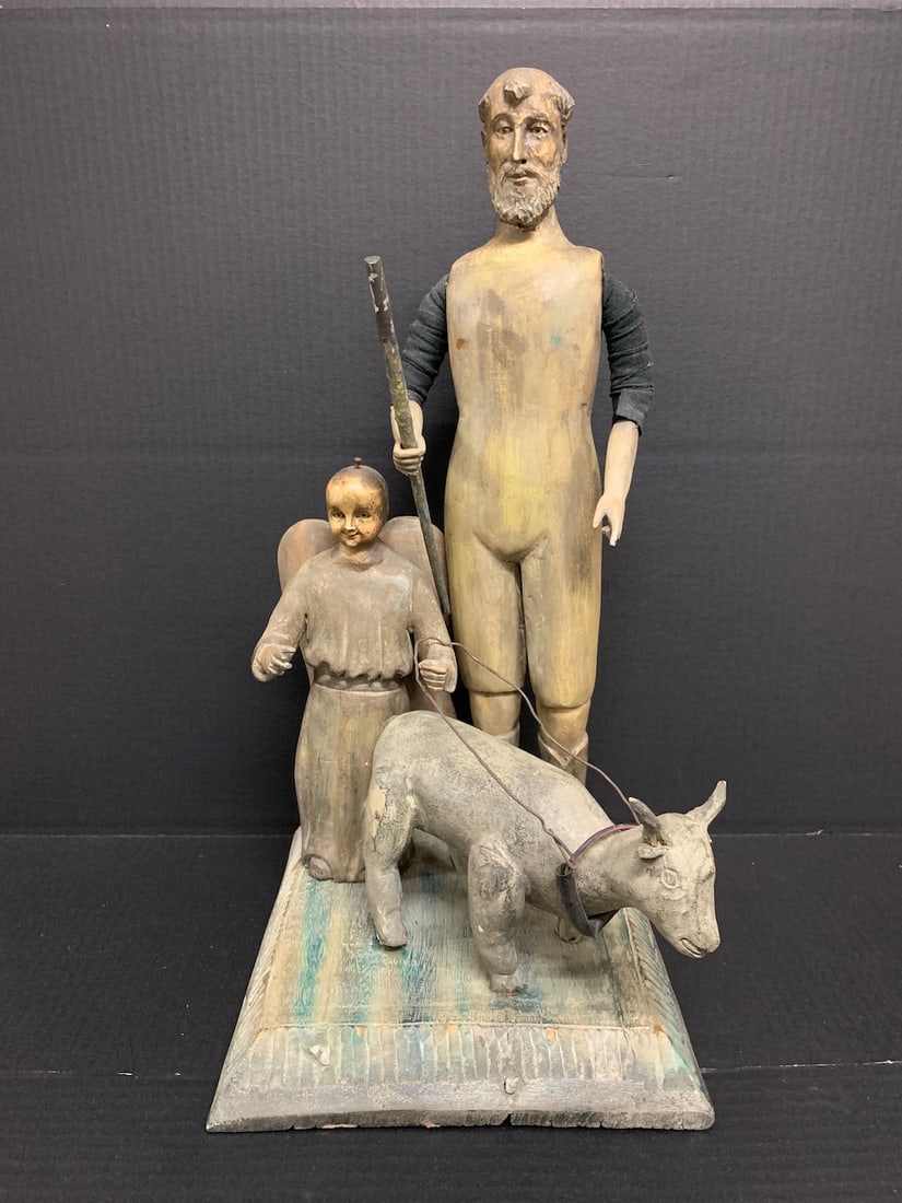Carved Wood Saint Isidore - The Farm Laborer Statue: Religious Art Carved Wood Saint Isidore - The Farm Laborer Statue. The dimension is 21.5 inches high x 11.5 inches depth x 10 inches wide. Please be aware that some of the items are vintage, secondhan