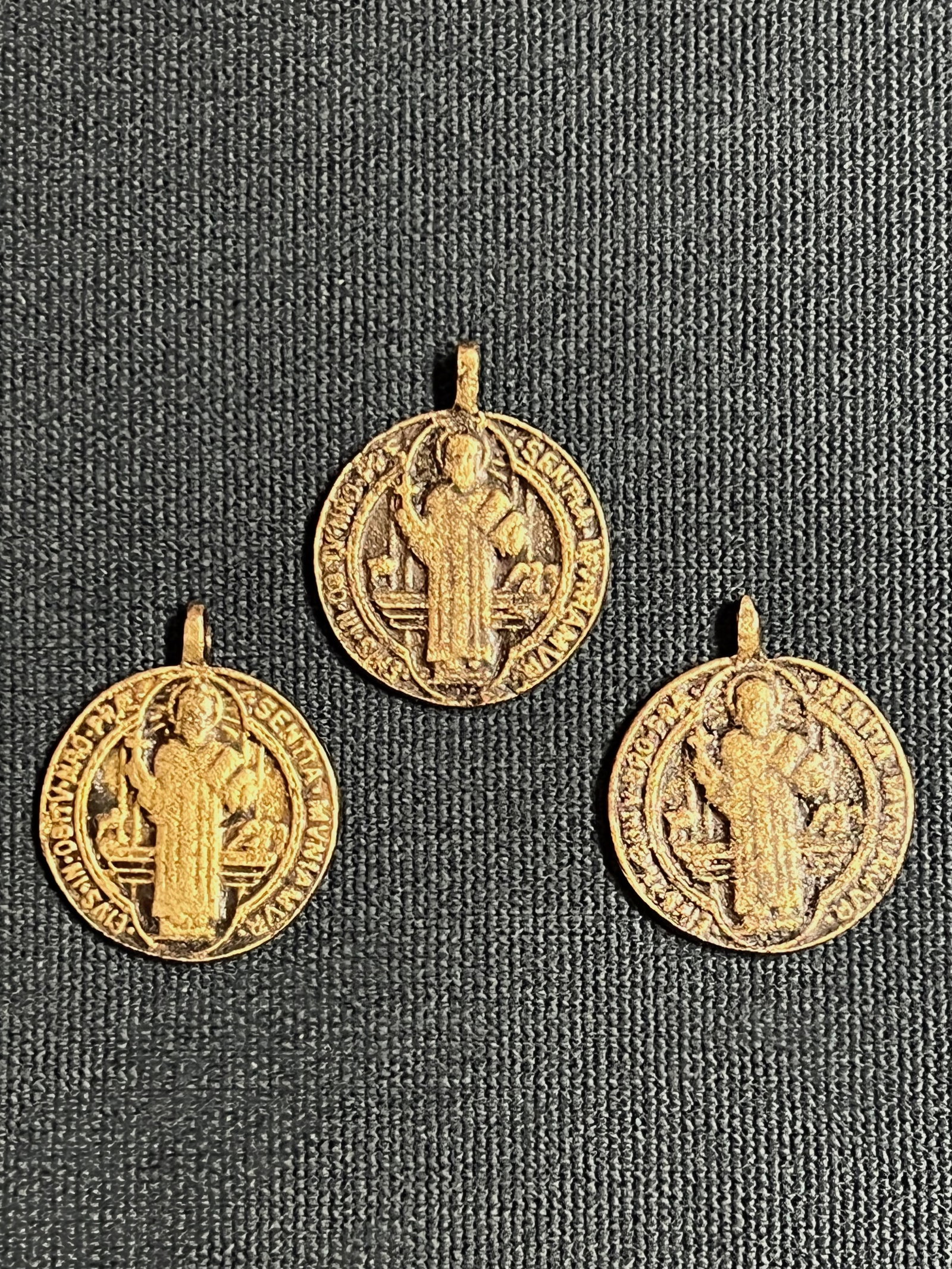Set of 3 Cast Brass Metal Medal/Amulet: Religious Art Set of 3 Cast Brass Metal Medal/Amulet. The dimension is 1.5 inches high x 1.25 inches wide. Please be aware that some of the items are vintage, secondhand, old ages, antiques and may ha