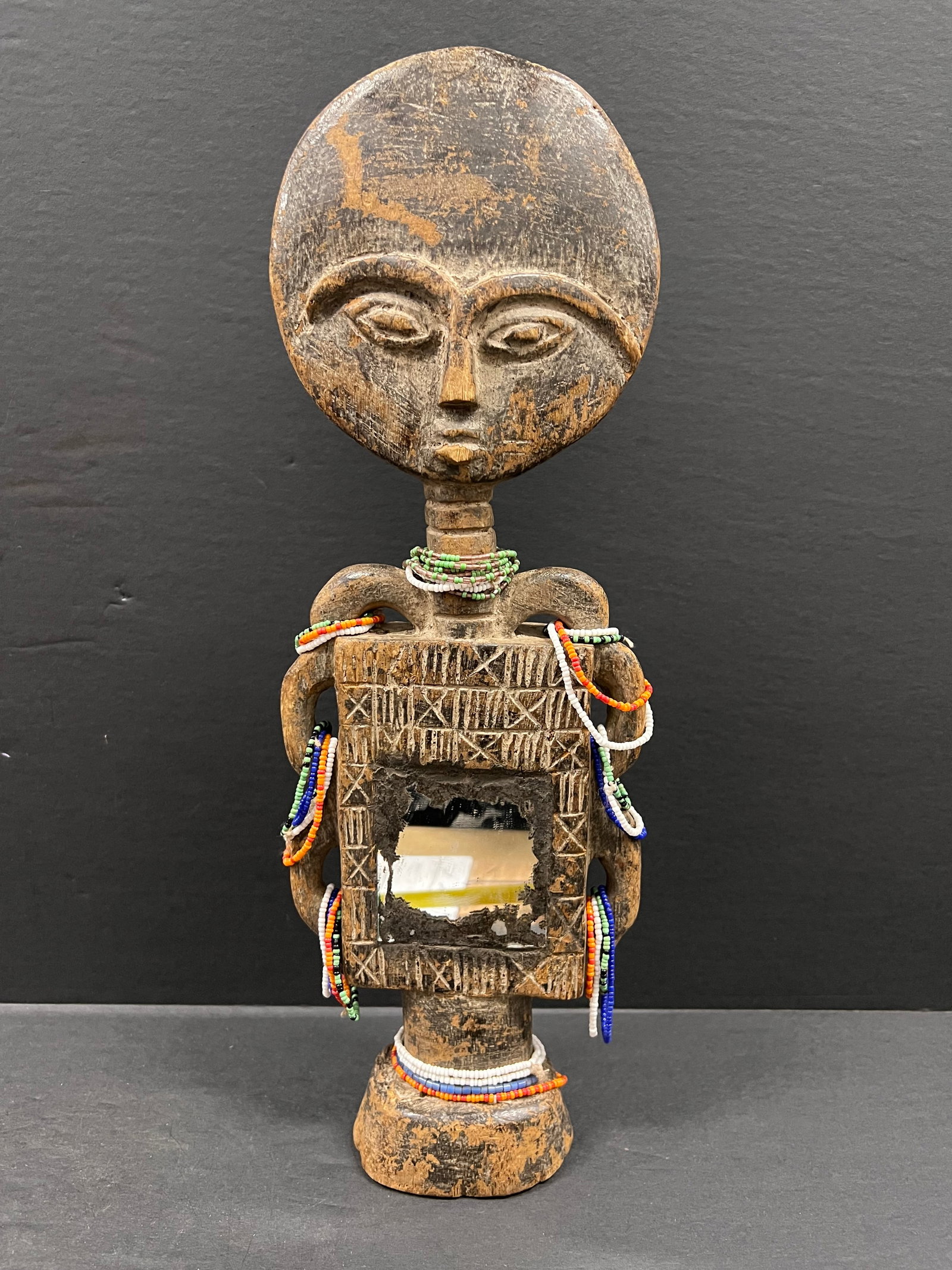 Carved Wood Ashanti Doll: African Tribal Art Carved Wood Ashanti Doll. The dimension is 15.5 inches high x 5.5 inches depth x 5.75 inches wide. Please be aware that some of the items are vintage, secondhand, old ages,