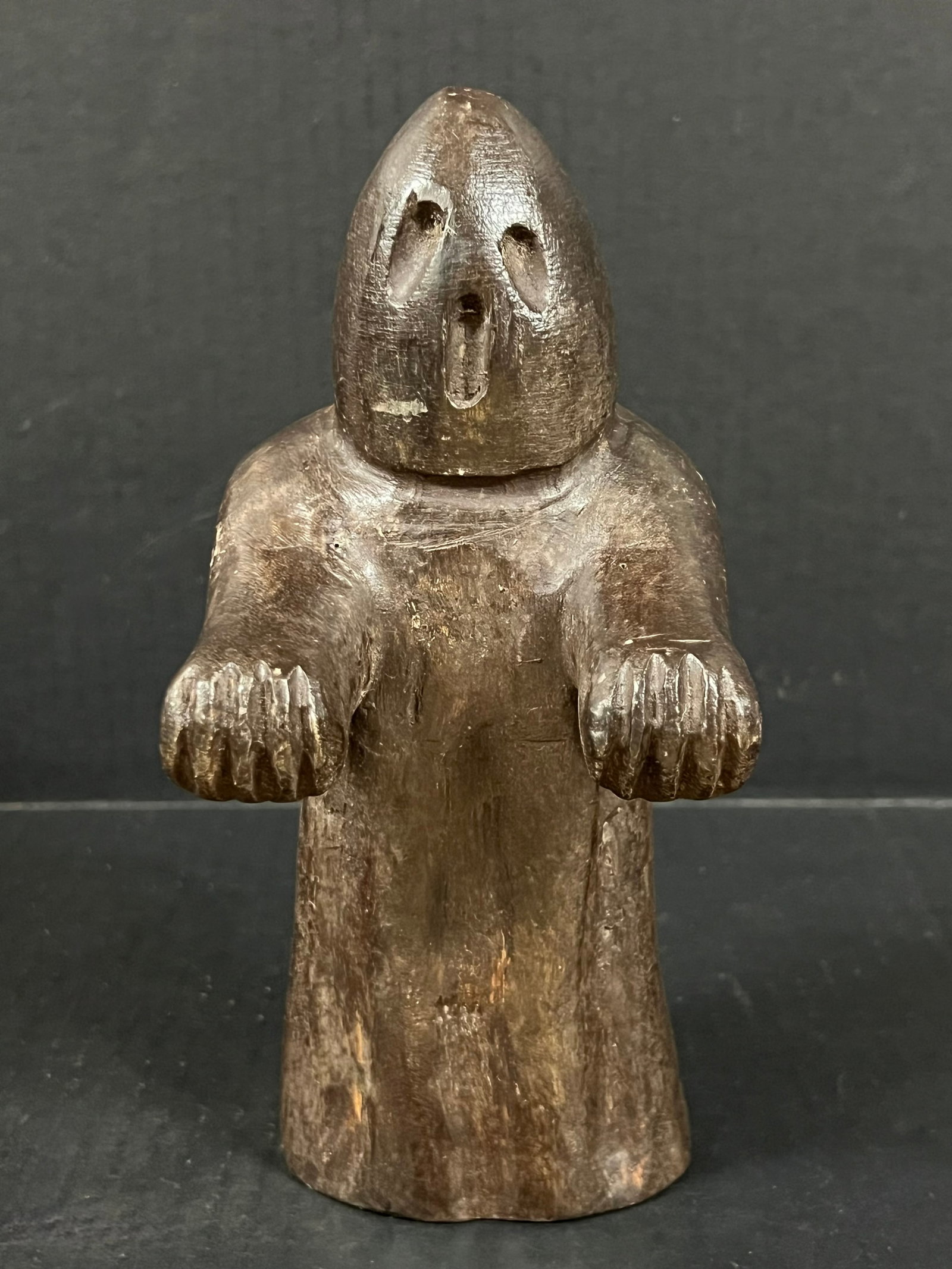 Carved Wood Ghost: Folk Art Carved Wood Ghost. The dimension is 9 inches high x 4.5 inches wide. Please be aware that some of the items are vintage, secondhand, old ages, antiques and may have a defects or sign of ages,