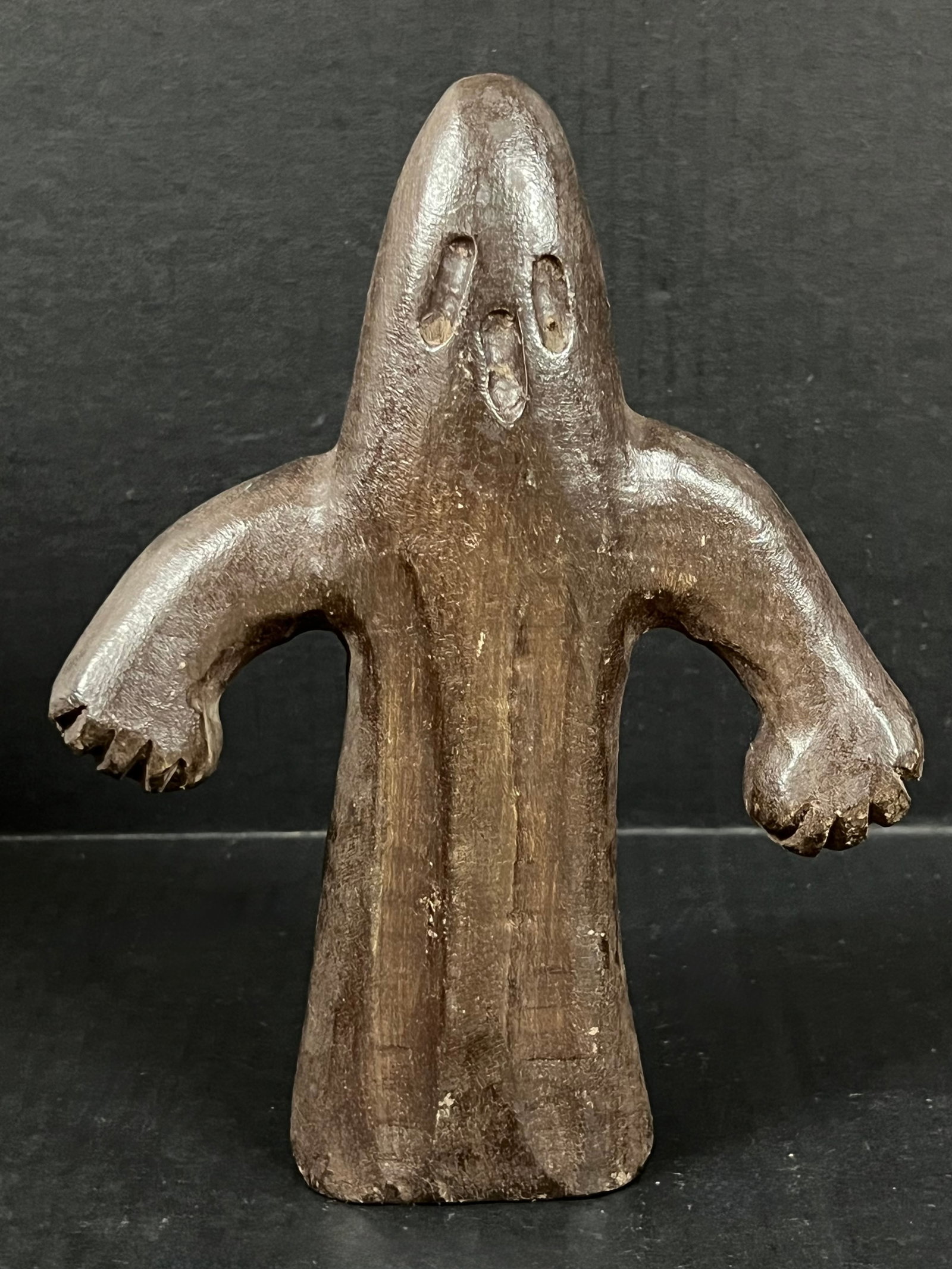 Carved Wood Ghost: Folk Art Carved Wood Ghost. The dimension is 9 inches high x 7 inches wide. Please be aware that some of the items are vintage, secondhand, old ages, antiques and may have a defects or sign of ages, H