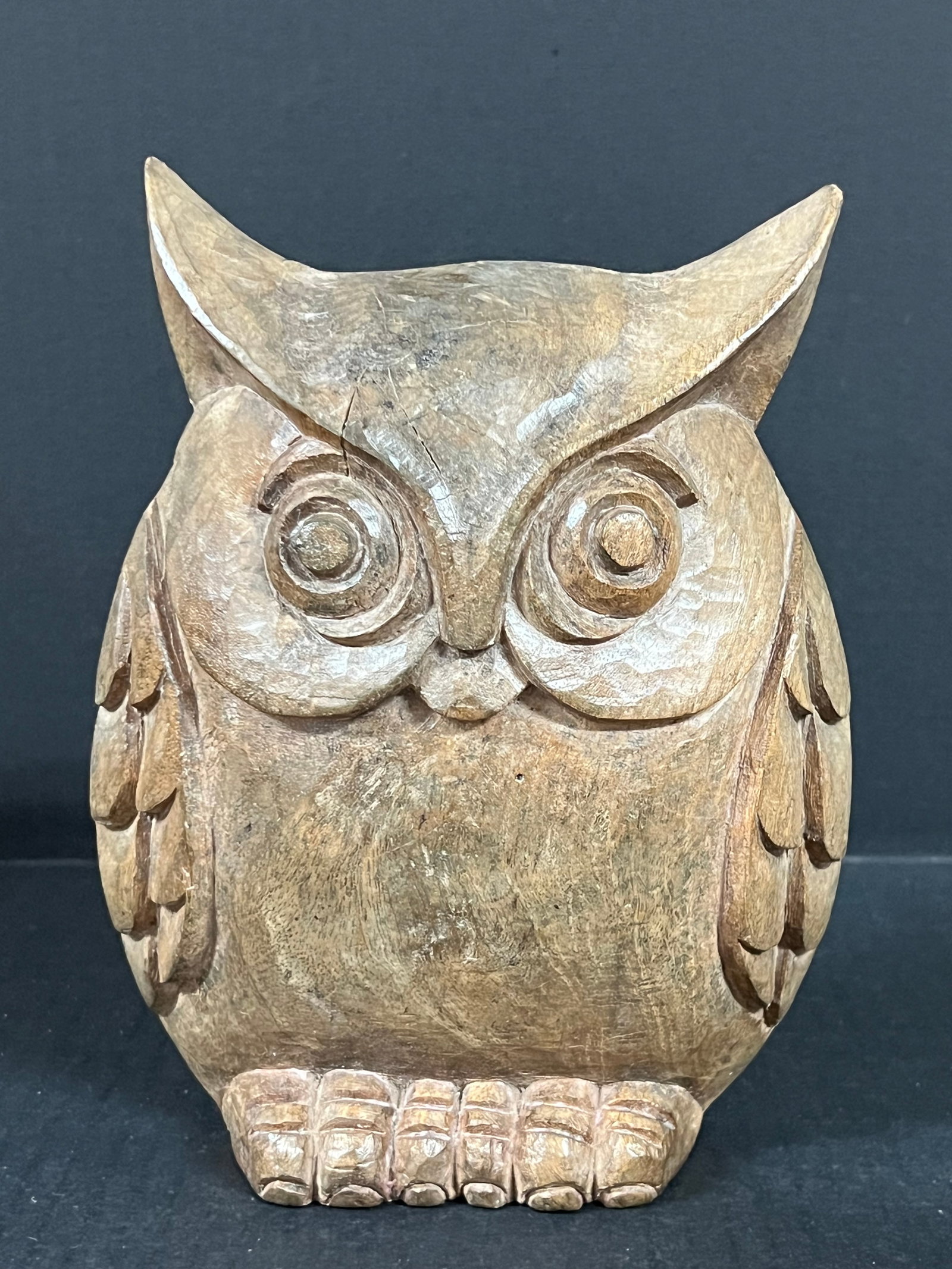 Carved Wood Owl: Folk Art Carved Wood Owl. The dimension is 8 inches high x 6.5 inches wide. Please be aware that some of the items are vintage, secondhand, old ages, antiques and may have a defects or sign of ages,