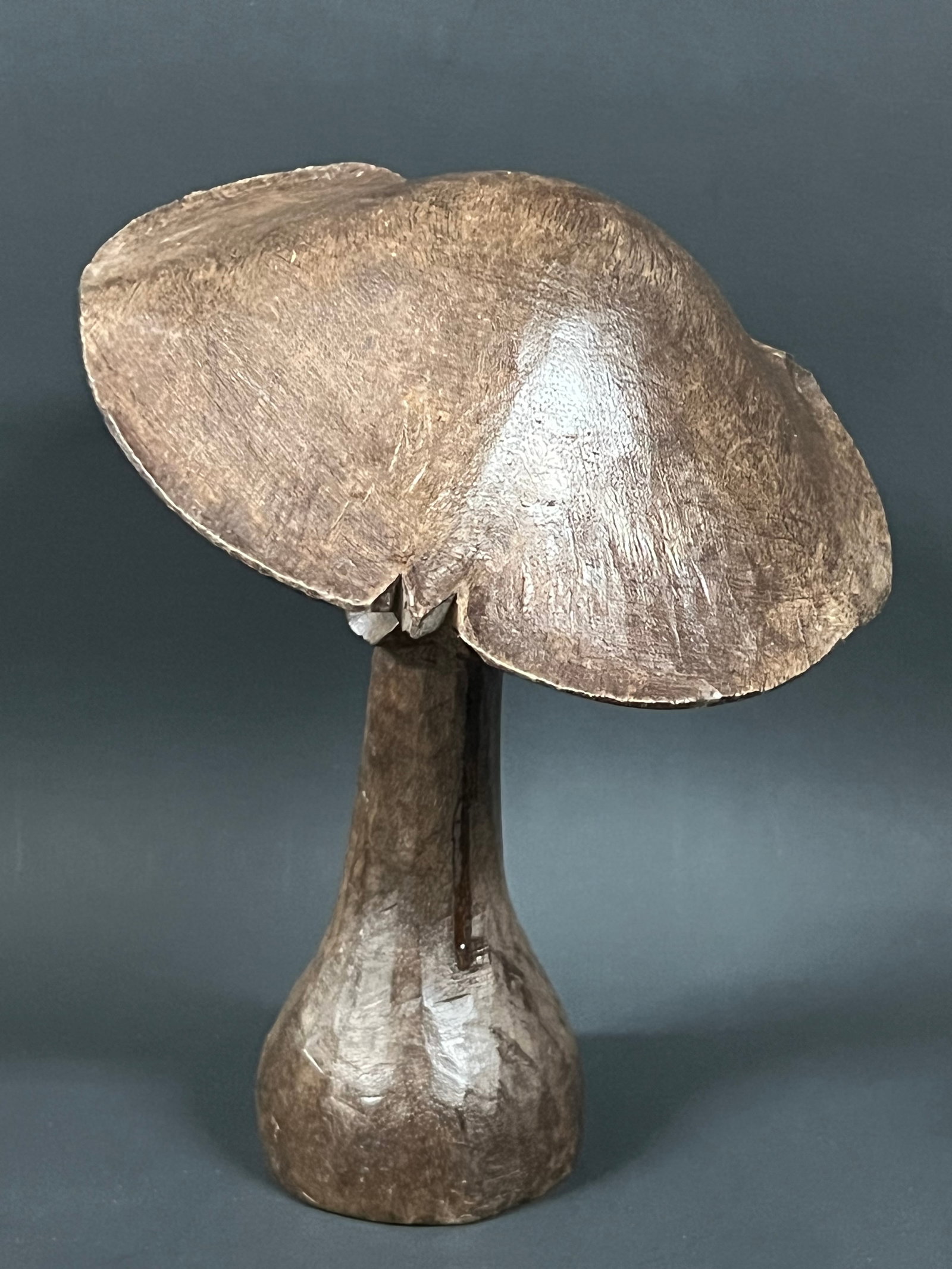Carved Wood Mushroom: Folk Art Carved Wood Mushroom. The dimension is 8 inches high x 6 inches wide. Please be aware that some of the items are vintage, secondhand, old ages, antiques and may have a defects or sign of ages