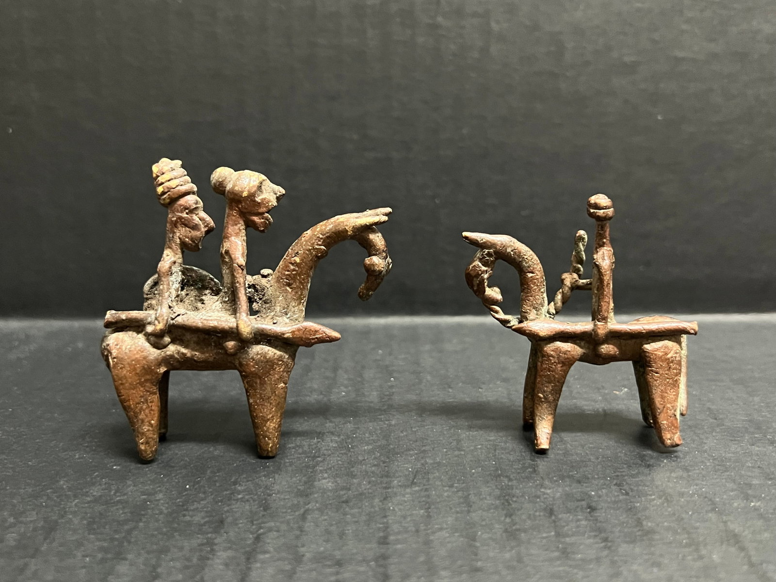 Pair of Bronze Kotoko Horsemen: African Tribal Art Pair of Bronze Kotoko Horsemen. The dimension is 2.5 inches high x 2.5 inches wide. Please be aware that some of the items are vintage, secondhand, old ages, antiques and may have a