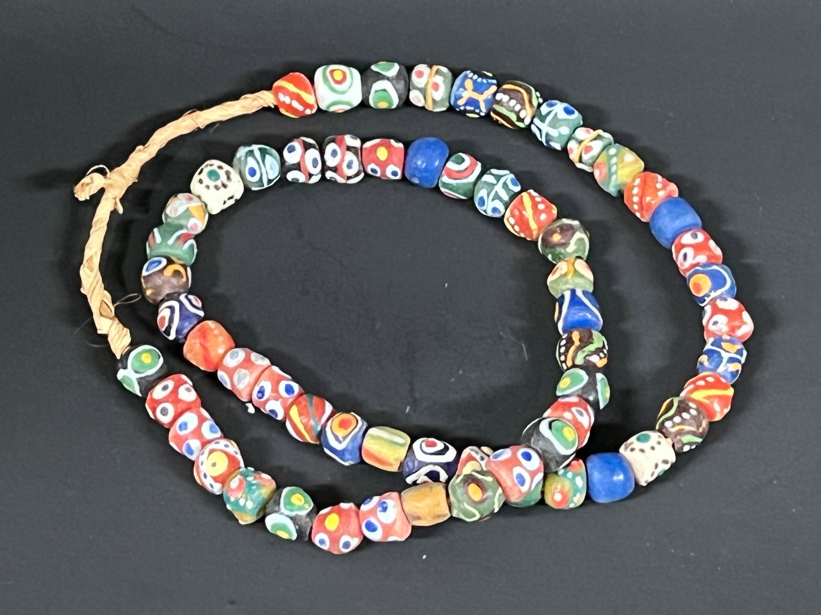 Glass Beads Necklace: African Tribal Art Glass Beads Necklace. The dimension is 28 Rounds. Please be aware that some of the items are vintage, secondhand, old ages, antiques and may have a defects or sign of ages, However 