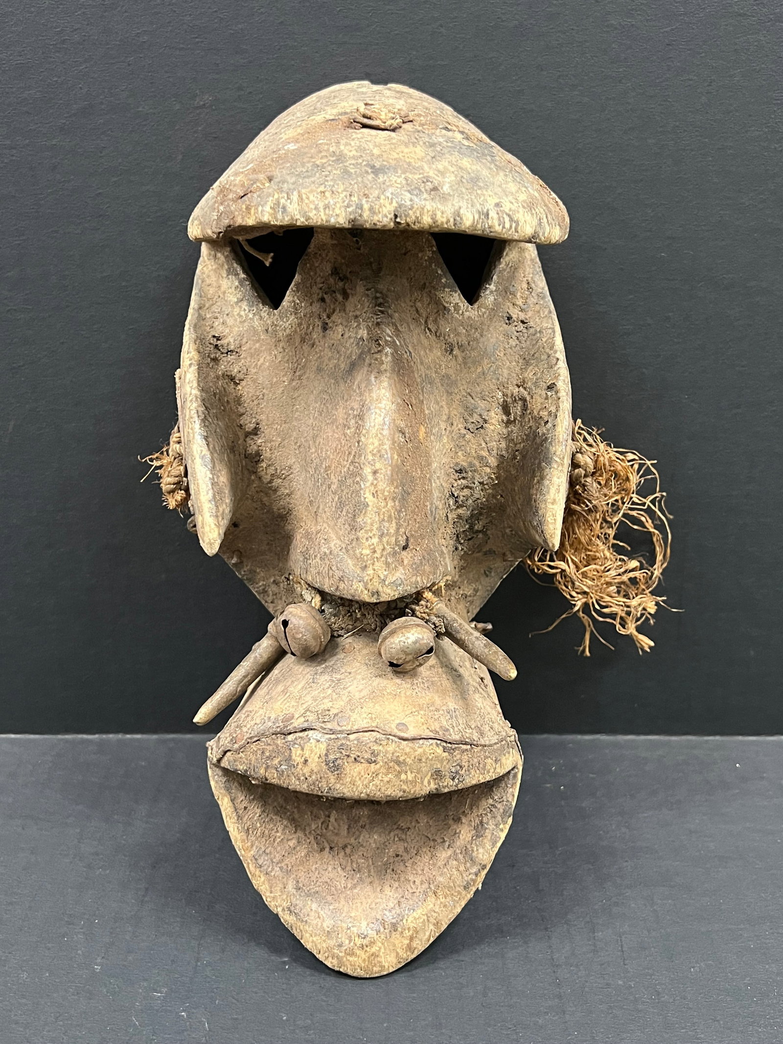 Dogon Mask: African Tribal Art Dogon Mask. The dimension is 12 inches high x 5.5 inches wide. Please be aware that some of the items are vintage, secondhand, old ages, antiques and may have a defects or sign of
