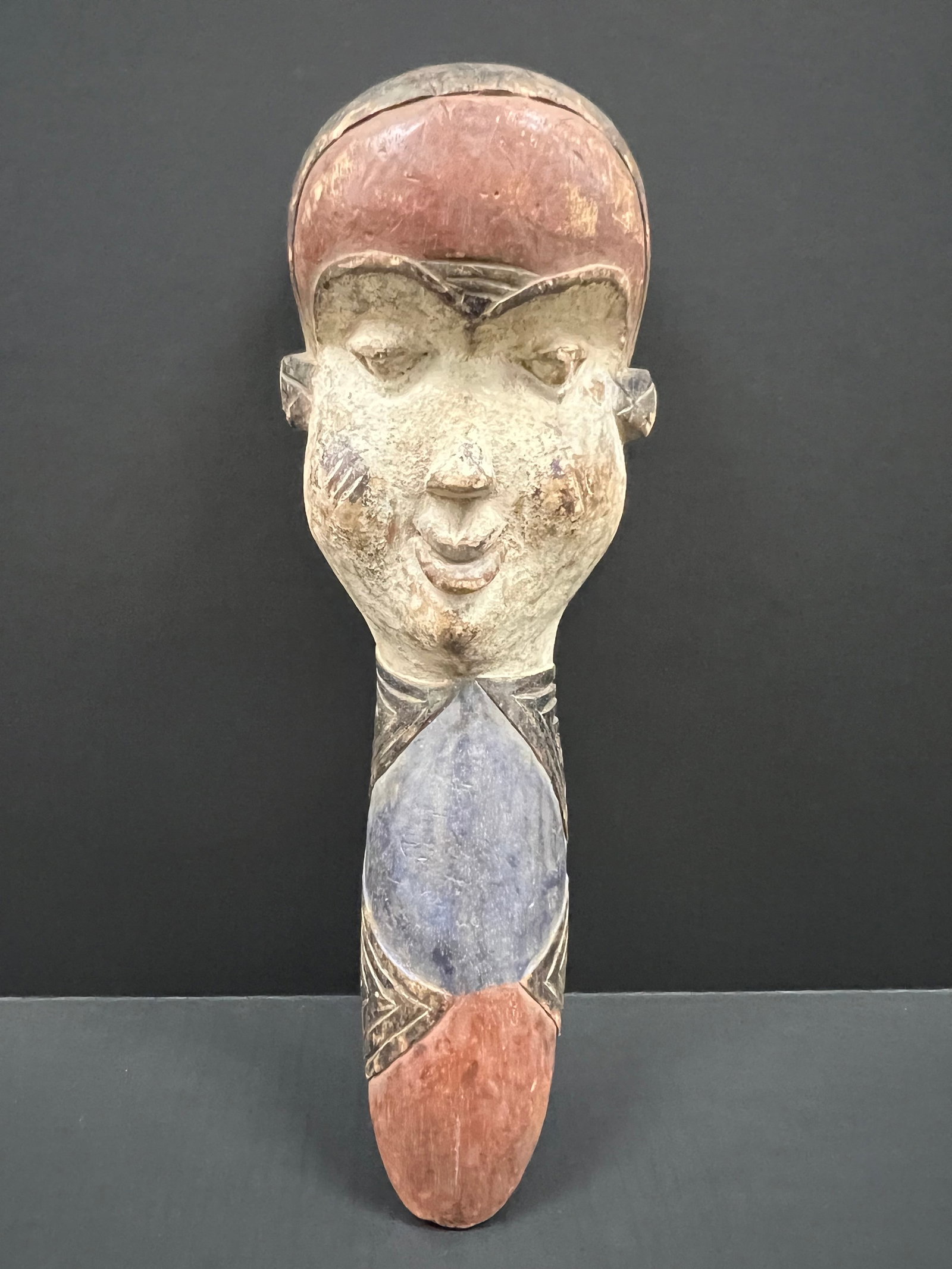 Carved Wood Pende Mask: African Tribal Art Pende Mask. The dimension is 19.5 inches high x 7 inches wide. Please be aware that some of the items are vintage, secondhand, old ages, antiques and may have a defects or sign of a