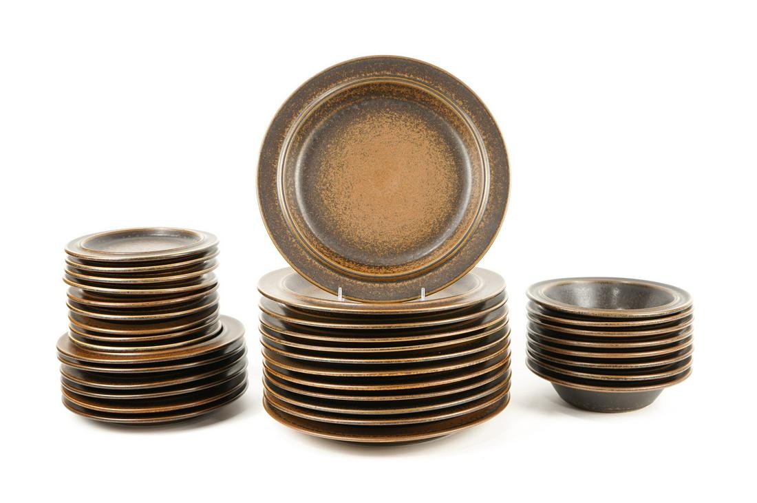 Ulla Procope for Arabia "Ruska" Place Settings: 12 dinner plates, 6 salad plates, 9 side plates and 8 bowls. Color variations in glazing during manufacturing as seen in pictures.