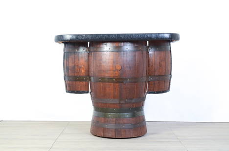 Wiskey Barrel Bar: Measures 50” wide, 24” deep, and 42” tall. Whiskey Barrel Bar made in Tennessee by Brothers Furniture in the 1970s. Very heavy weight. These are supposed to be from Jack Daniels