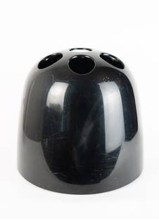 Dedalo Umbrella Stand by Emma Gismondi Schweinberger for Artemide: Black plastic umbrella holder, designed by Emma Gismondi Schweinberger and produced by Artemide, Italy in roughly 1966. Molded attribution mark on the underside. 14 inches tall, 15 inches in diameter.