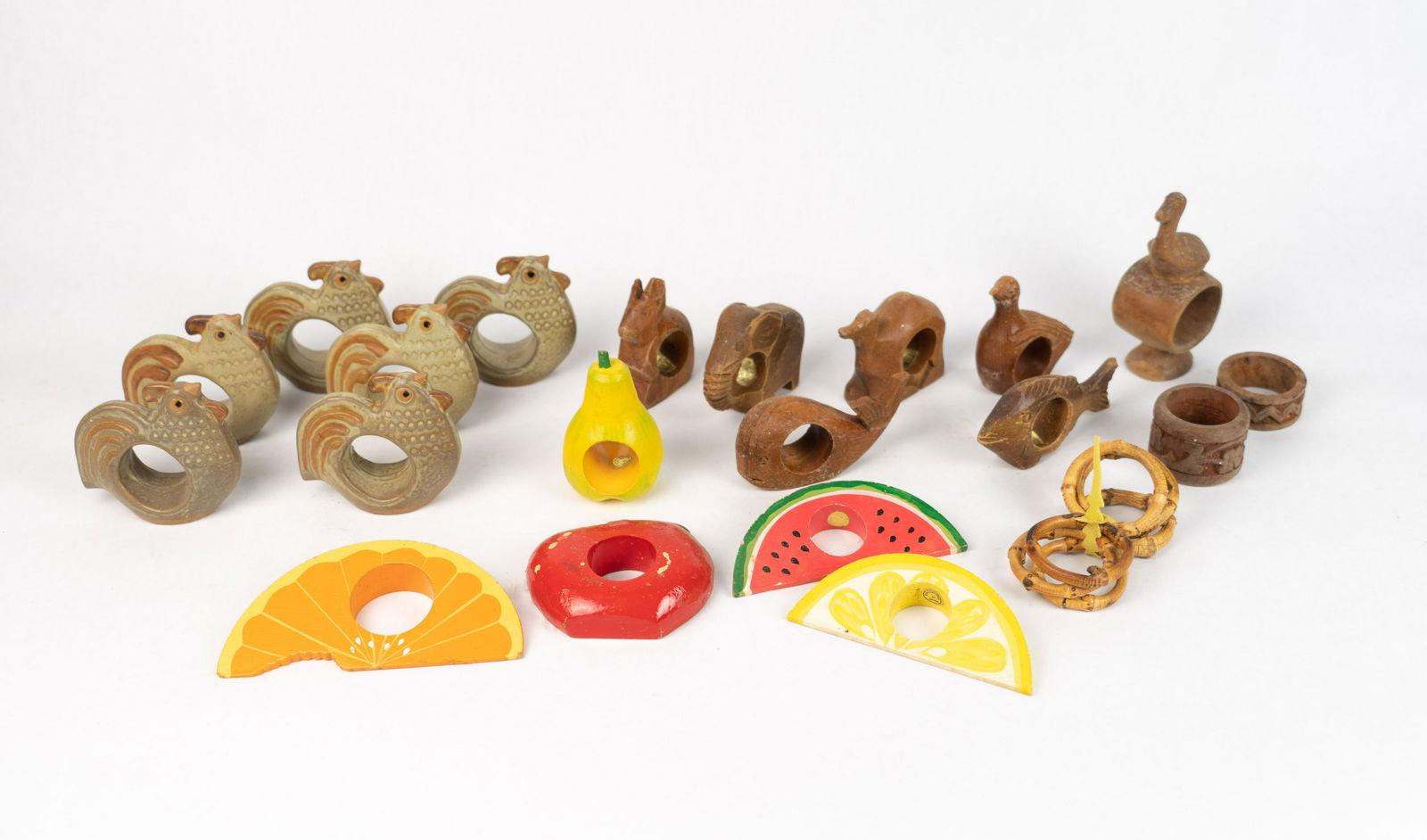 Lot of Napkin Rings: Food painted fruit (made in the Philippines), carved animals (made in Philippines), ceramic birds (made in Japan) and bamboo.