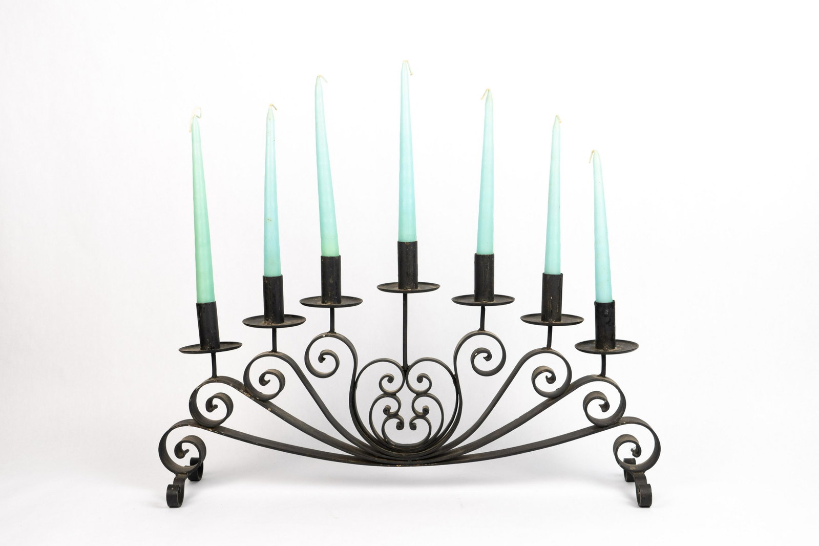 Iron Candelabra: 24 inches wide, 5.25 inches deep and 12.25 inches tall to top of metal candle holder.