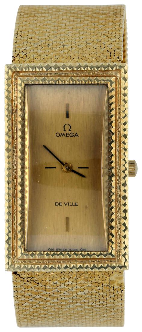 OMEGA De Ville, Damenarmbanduhr, aus der ...: OMEGA De Ville, Damenarmbanduhr, aus der Kollektion «About Times» designt von Andrew Grima, hergestellt zwischen 1970 und 1972, Signatur A.G., in Gelbgold 18K, Handaufzug, massives Goldband, in Gelb