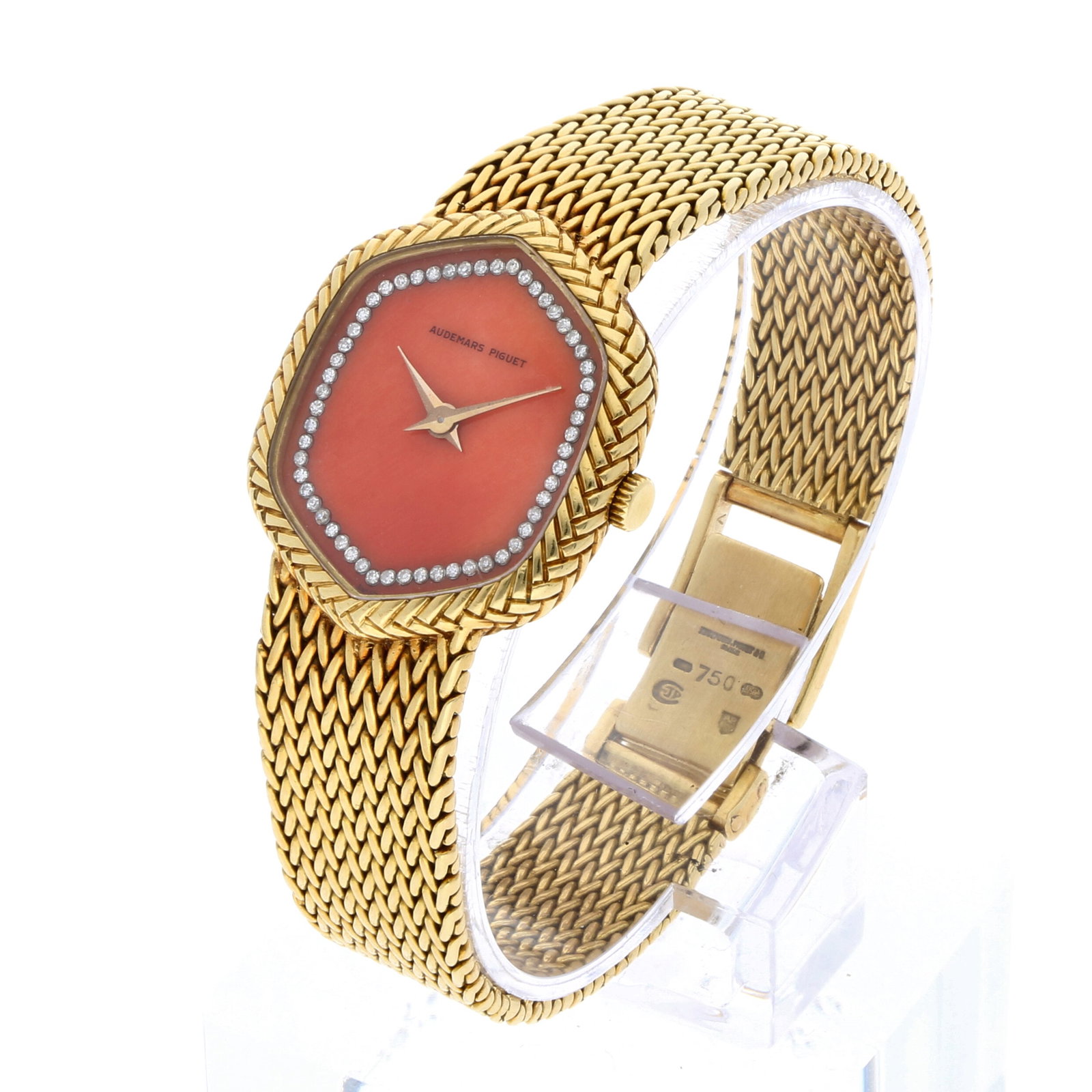 Audemars Piguet: AUDEMARS PIGUET DAMENUHR CORAL CABOCHON, 18K Gelbgold, Herstellungsjahr ca. Ende 1970er Jahre, Durchmesser 27 mm x 23 mm, Gehäuse Hexagonales Gehäuse aus 18K Gelbgold mit fein
