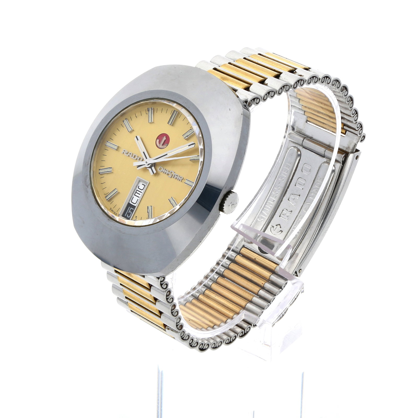 Diverse Marken: RADO DIASTAR DAY-DATE, Edelstahl, Referenz 636.0308.3, Herstellungsjahr ca. 1980, Durchmesser 35 mm x 42 mm, Gehäuse Markantes Tonneau-Gehäuse mit polierter Hartmetall-Lünette und