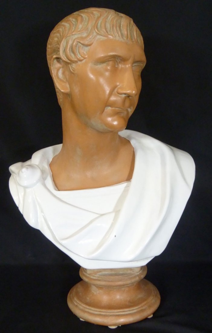 Italian Sculpture of the Roman Emperor Caesar: Exceptional Large Italian Bust of Caesar | Hand made in Italy of Terracotta | The upper section of the bust is fashioned of red clay, below of which is Caesar's Robe in a white glazed classical attire