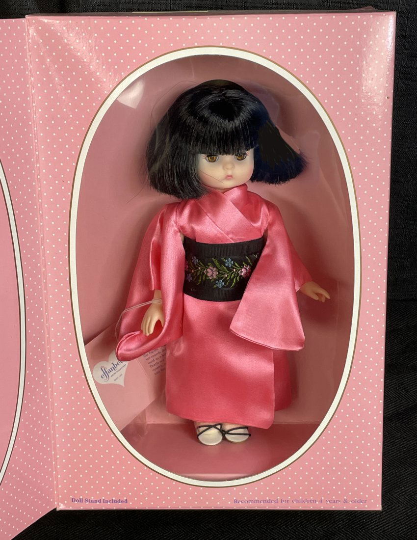 Effanbee Li'l Innocents International Collection JAPAN: This Doll is JAPAN, Style 2877. She is part of the Effanbee Li'l Innocents International Collection in 1989, which consisted of 7 Dolls from various countries. She is 9 inches tall and is all vinyl. E
