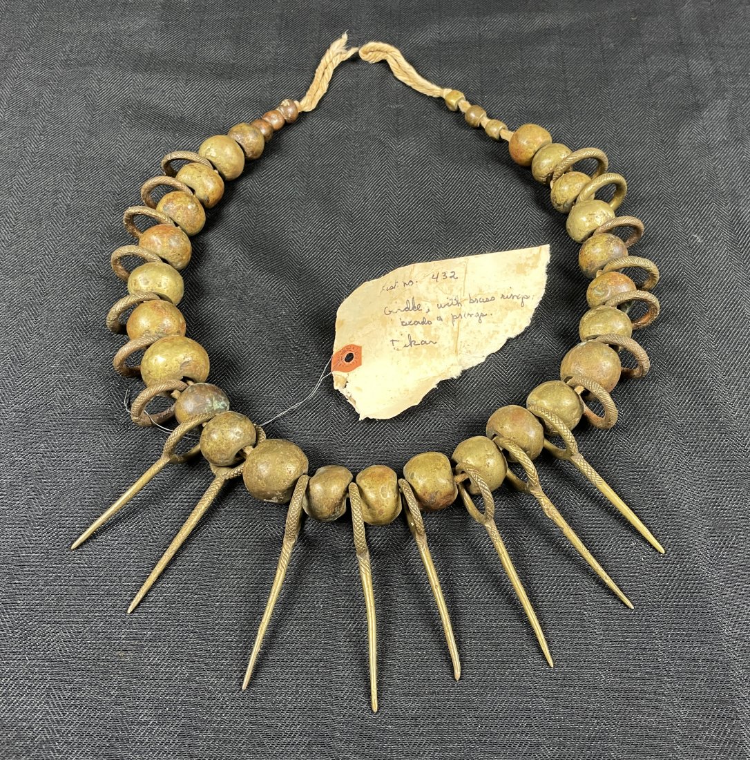 Large Antique West African Bronze Necklace: Large West African Bronze Necklace decorated with bronze/brass beads, rings, and spikes/prongs. Cast in bronze (copper/brass alloy) (lost wax method). The beads and rings measure approx. 1" Diameter, 