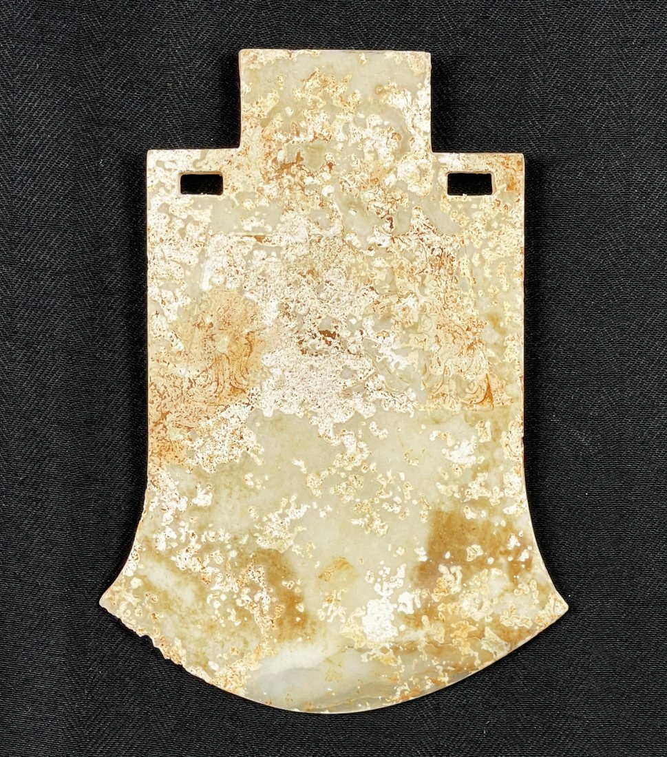 Archaic Chinese White Jade Axe Head: Ancient / Archaic Chinese White Nephrite Mutton Fat Jade Axe Head | This semi-translucent stone has beautiful incised fretwork decorations in panels on each side of the artifact, with tones of white a
