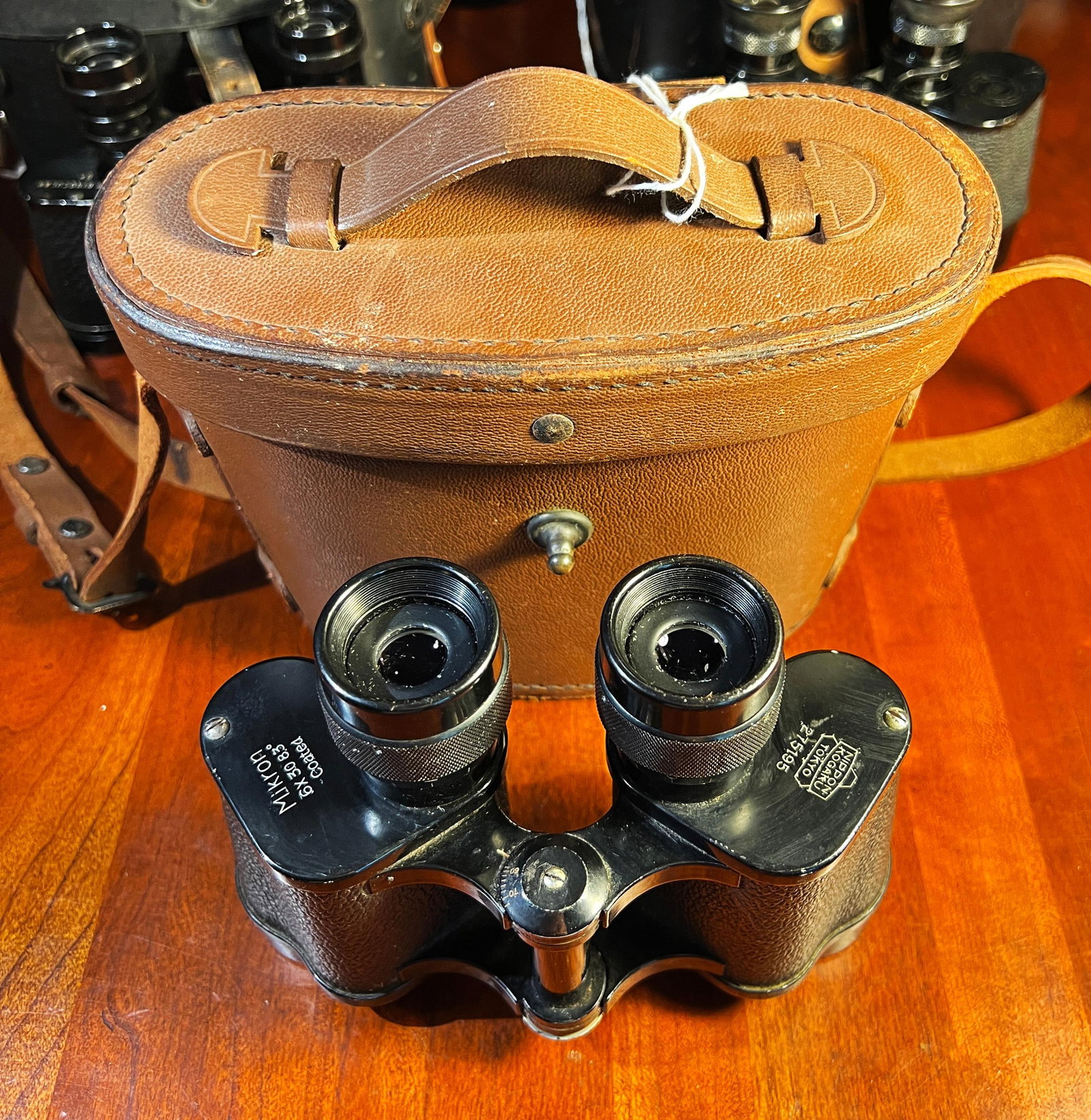 Mikron 6 x 30, 83-degree Coated Nippon Kogaku Tokyo: Mikron 6 x 30, 83-degree Coated Nippon Kogaku Tokyo. Serial # 275195 Marked JAPAN EP on lower hinge cap. Includes brown leather case that has closing lid with handle and strap. Excellent Working Condi