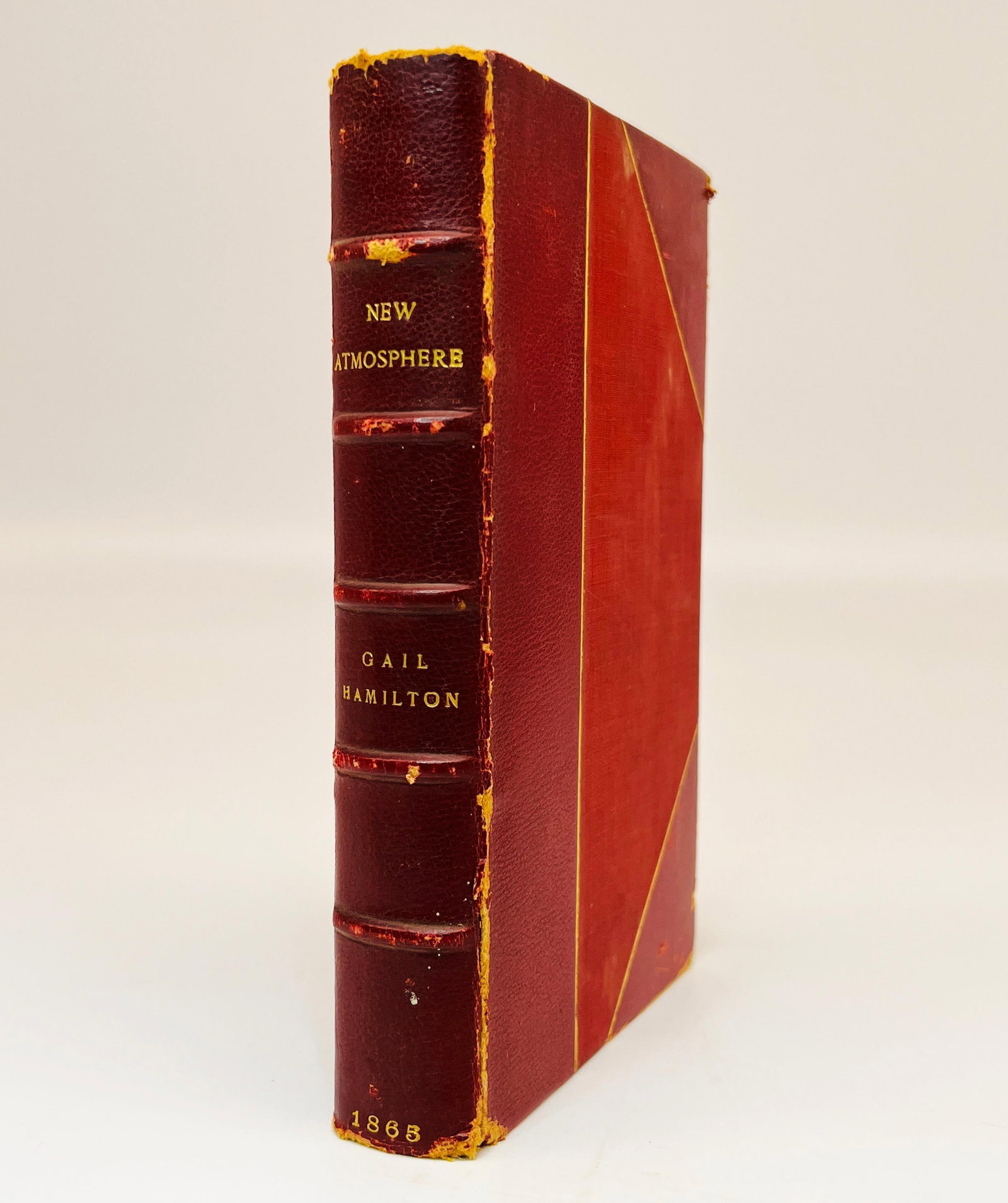 Antique First Ed. Book A NEW ATMOSPHERE by Gail Hamilton (Mary Abigail Dodge): Antique First Ed. Book A NEW ATMOSPHERE by Gail Hamilton (Mary Abigail Dodge) | First Edition - Published by Ticknor and Fields, Boston, 1865 | Hardcover leather bound book with gold gilt lettering to