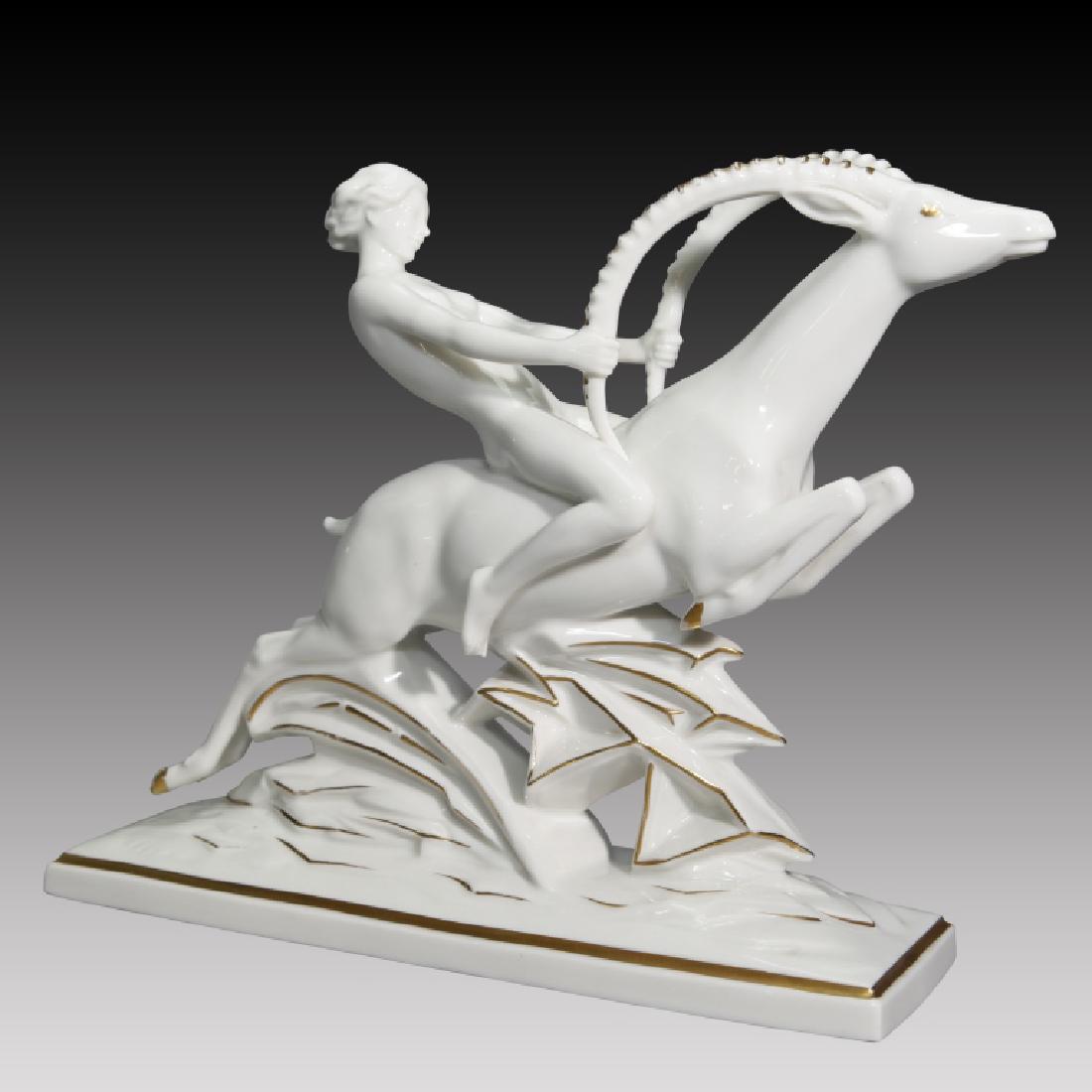 Hutschenreuther Art Deco Nude Woman Riding Gazelle: Hutschenreuther Art Deco Nude Woman riding Gazelle with golden highlights. Artist impressed - M. Herm Fritz.; Circa: 20th century. Origin: Germany; Dimensions: 9.5"H x 11.0"L x 3.5"W;